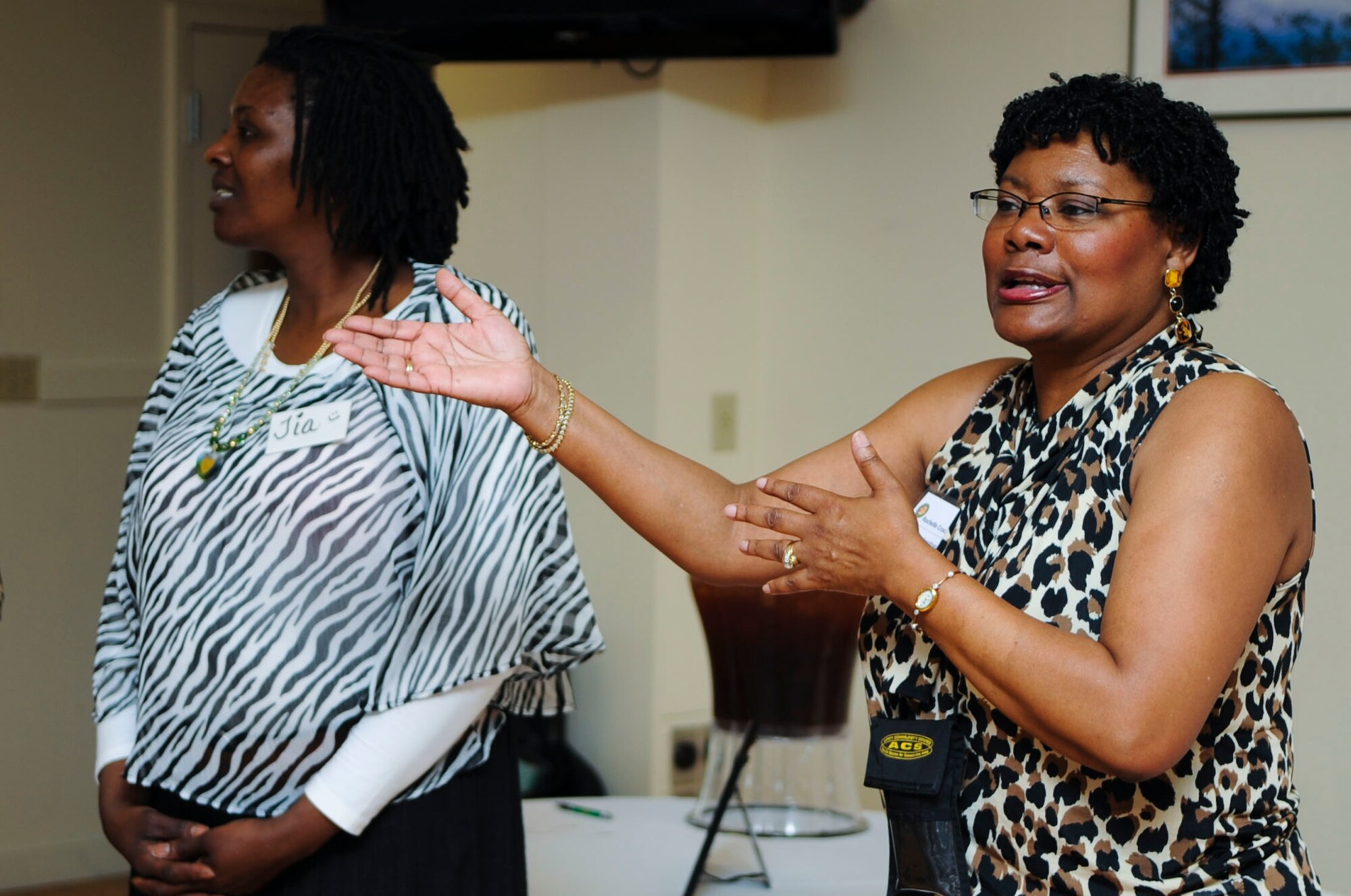 Rochelle Crockett, Survivor Outreach Services programs manager, explains a group activity during a Gold Star Wives Day event at Fort Eustis, Va., April 3, 2014. Gold Star families are relatives of Service members who gave the ultimate sacrifice while serving in the military. (U.S. Air Force photo by Senior Airman Austin Harvill/Released) 