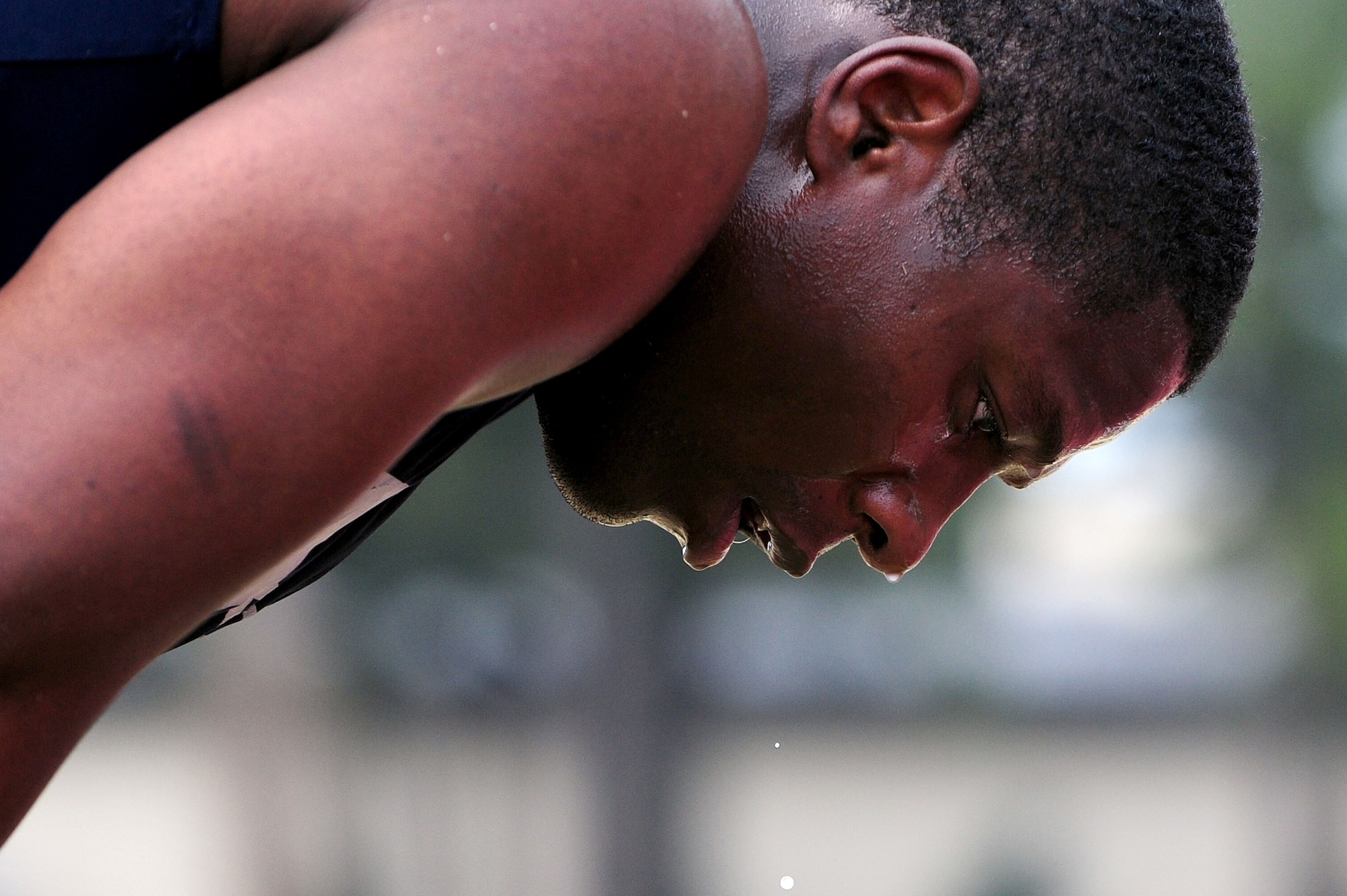 Staff Sgt. Tony Hough, 4th Communications Squadron communications focal point technician, catches his breath during a combat fitness class, April 3, 2014, at Seymour Johnson Air Force Base, N.C. The new class is an advanced circuit-styled fitness course, themed around strength and cardio. (U.S. Air Force photo by Senior Airman John Nieves Camacho)