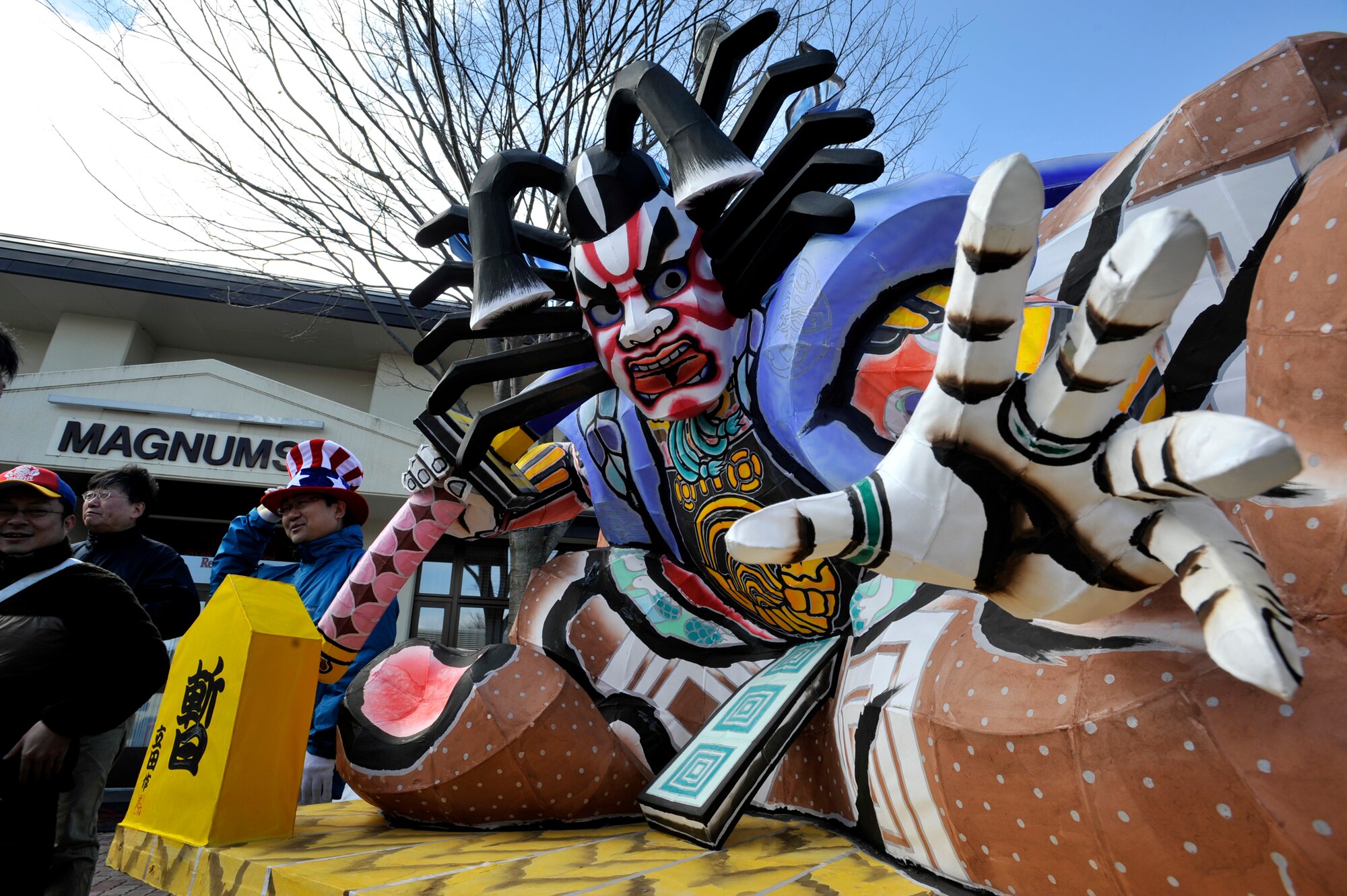 MISAWA AIR BASE, Japan – Japanese exhibitors position a Aomori Nebuta float at Misawa Air Base, Japan, April 5, 2014. The float was the main theme for this year’s Japan Day event and represents the float participants carry during the Aomori Prefecture Nebuta festival. (U.S. Air Force photo/Staff Sgt. Tong Duong) 