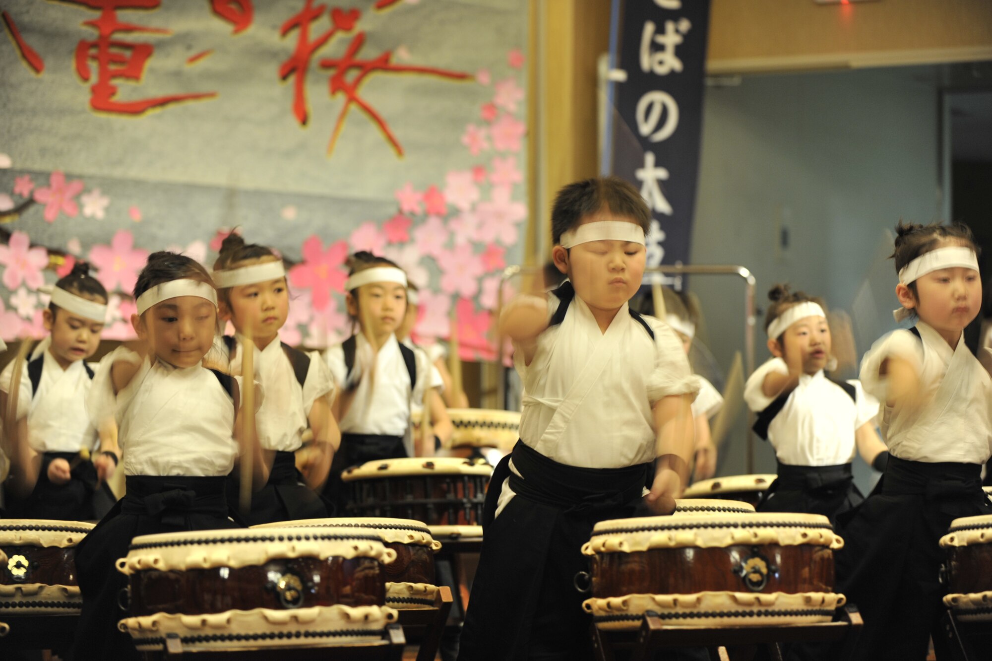 MISAWA AIR BASE, Japan – Makibano children drummers from Towada, Japan, perform for Misawa Air Base family members, April 5, 2014. More than 3,000 base residents attended Japan Day 2014 to asorb Japanese culture. (U.S. Air Force photo/Staff Sgt. Tong Duong) 