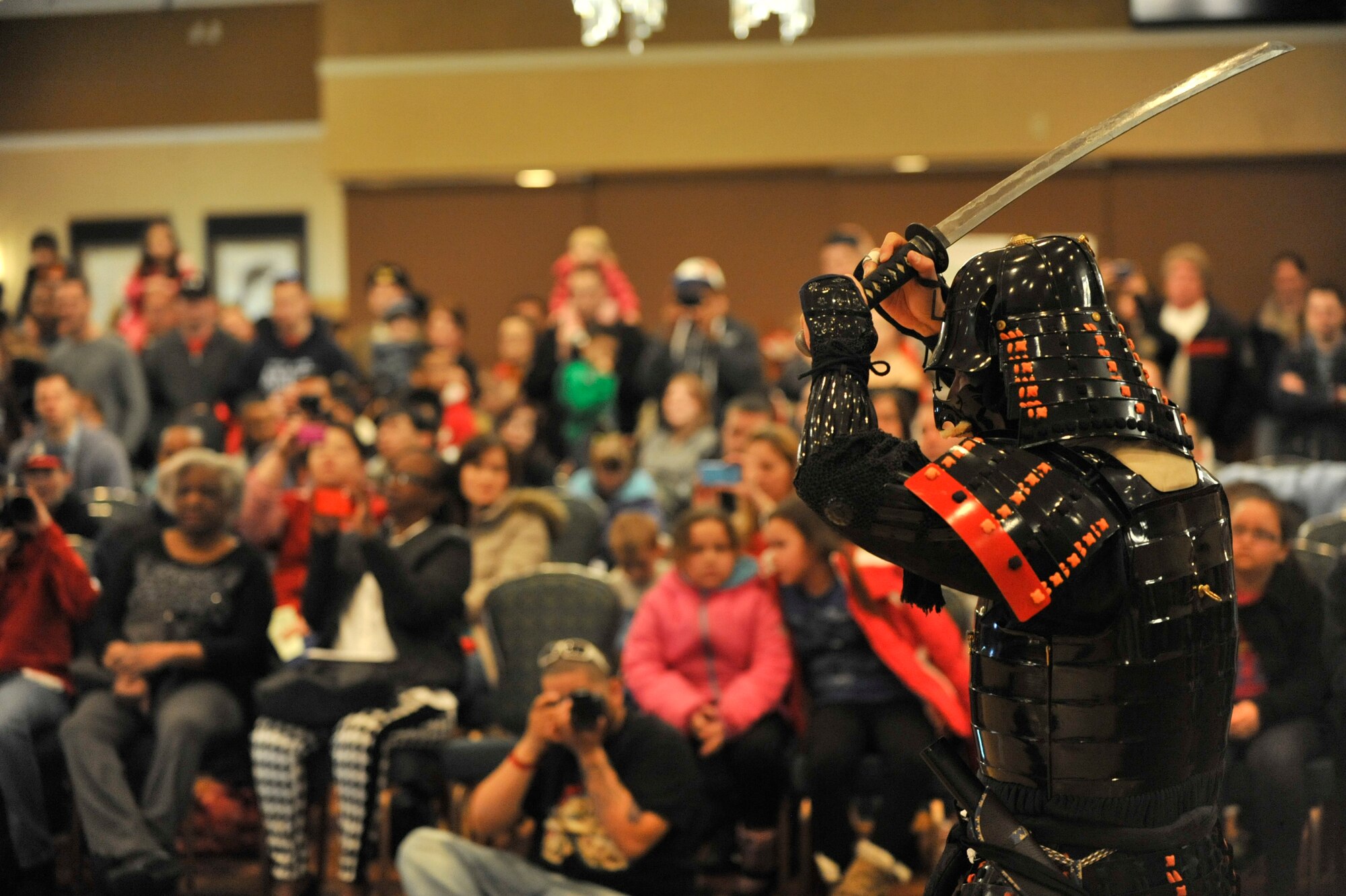 MISAWA AIR BASE, Japan – American and Japanese spectators watch a Samurai sword fighting demonstration at Misawa Air Base, Japan, April 5, 2014. This was the 27th Annual Japan Day event which allowed Misawa service members and their families to experience their host nation’s culture. (U.S. Air Force photo/Staff Sgt. Tong Duong) 