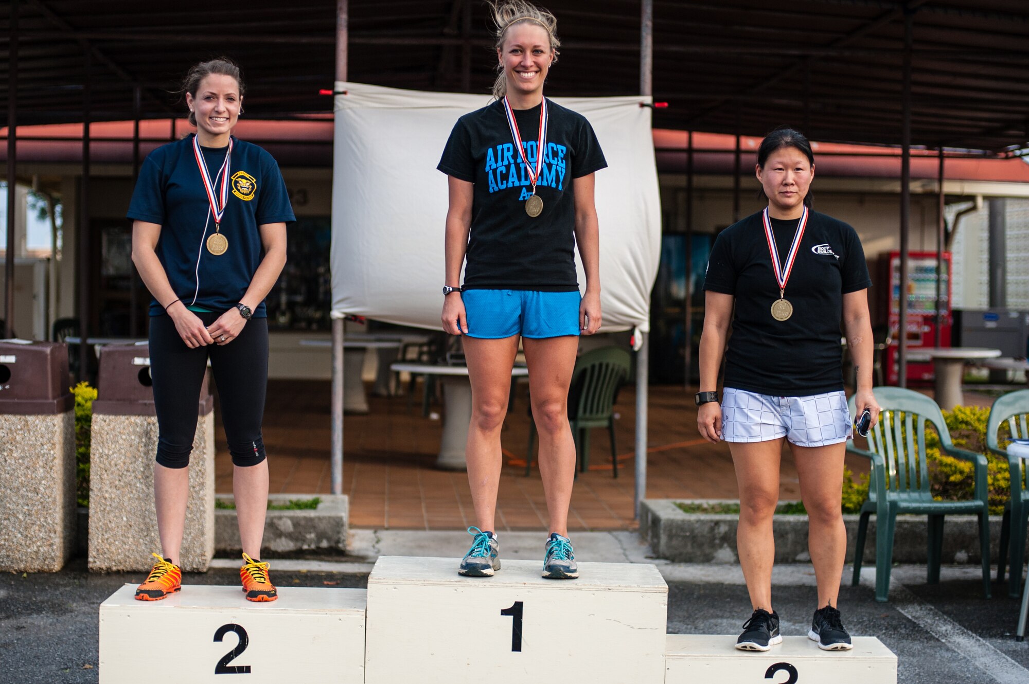 The first three female runners to cross the finish line of the Air Force Assistance Fund Habu Trail 6.5K are: 2nd Lt. Allison Paddock, an 18th Comptroller Squadron budget analyst, in first place with 32 minutes, 28 seconds; Capt. Sarabeth Hershey, an 18th Aeromedical Evacuation Squadron flight nurse, in second place with 32:40; and Tech. Sgt. Lauren Berger, an 18th Security Forces Squadron training instructor, in third place with 33:26. The run was held to gather donations for the AFAF campaign on Kadena Air Base, Japan, April 4, 2014. (U.S. Air Force photo by Staff Sgt. Alexy Saltekoff)