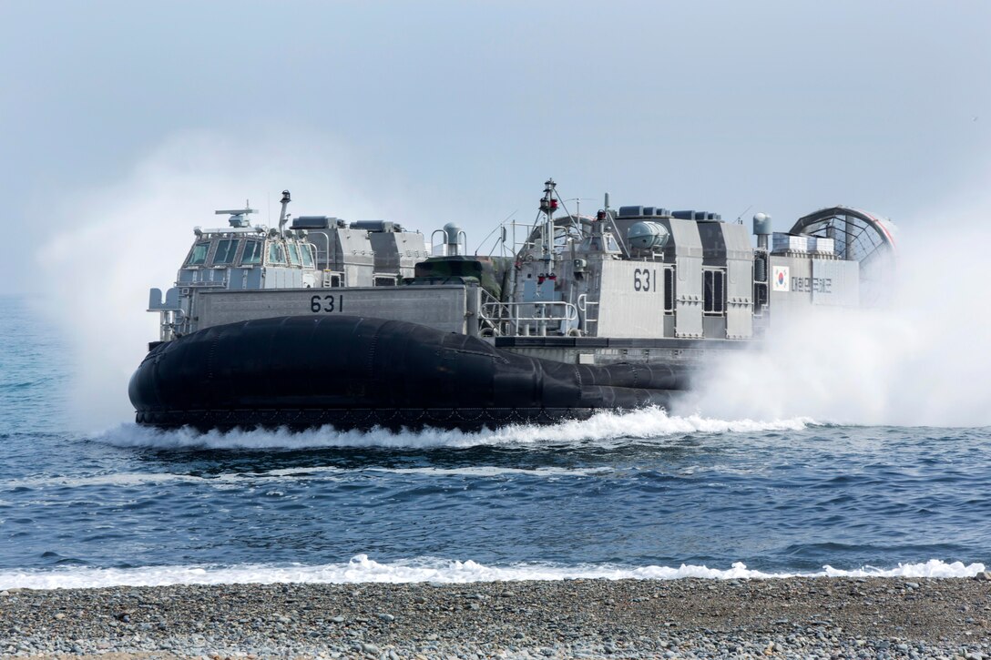 A Korean landing craft air cushion prepares to land on a beach to unload equipment and personnel during Ssang Yong 2014 on Doksoek-ri, Pohang, South Korea, March 31, 2014.