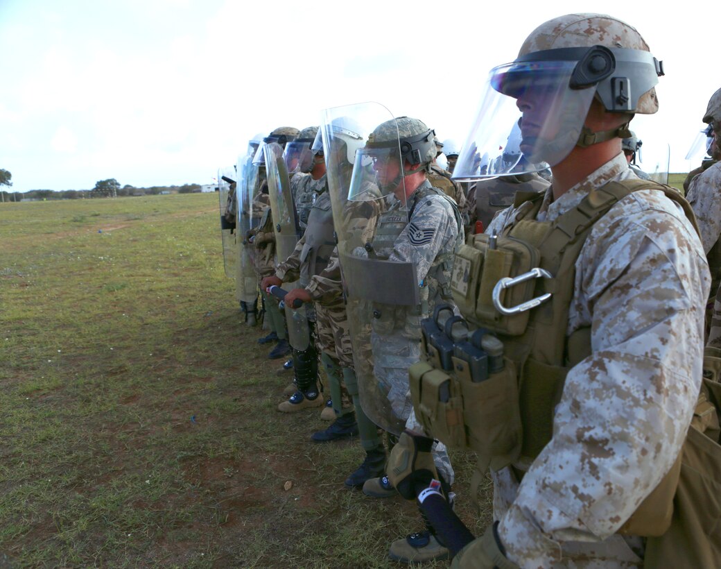 Military police officers from the U.S. Marines, Army and Air Force, along with Royal Moroccan soldiers specializing in riot-control, found common ground as enforcers of the law during African Lion 14, an annually-scheduled, multilateral training engagement that is hosted by the Kingdom of Morocco. One of the largest of its kind on the continent, the engagement shows the commitment of the participating nations to military friendships, strategic partnerships and regional and global security.
