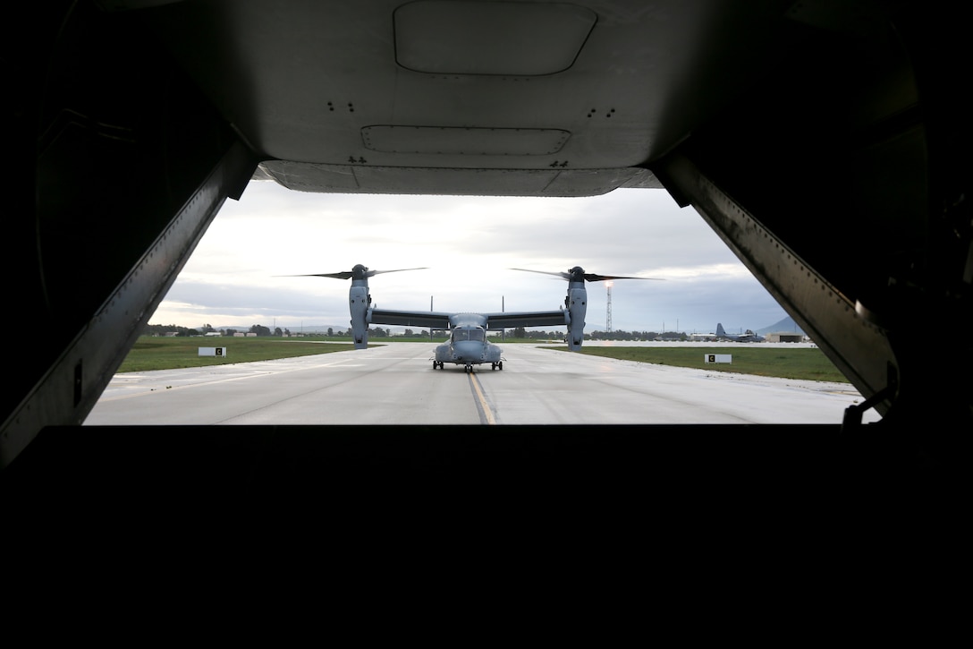 U.S. Marines with Special-Purpose Marine Air-Ground Task Force Crisis Response board an MV-22B tiltrotor Osprey travelling to Tifnit Military Instillation, Morocco, April 3, 2014 as a part of exercise African Lion 14. SP-MAGTF Crisis Response is a self-deployable, highly mobile response force allocated to U.S. Africa Command to respond to missions in permissive and uncertain environments to protect U.S. citizens, interests and other designated persons. SP-MAGTF Crisis Response participated in the exercise  to train their rapid response capability. (U.S. Marine Corps photo by Lance Cpl. Alexander Hill/Released)
