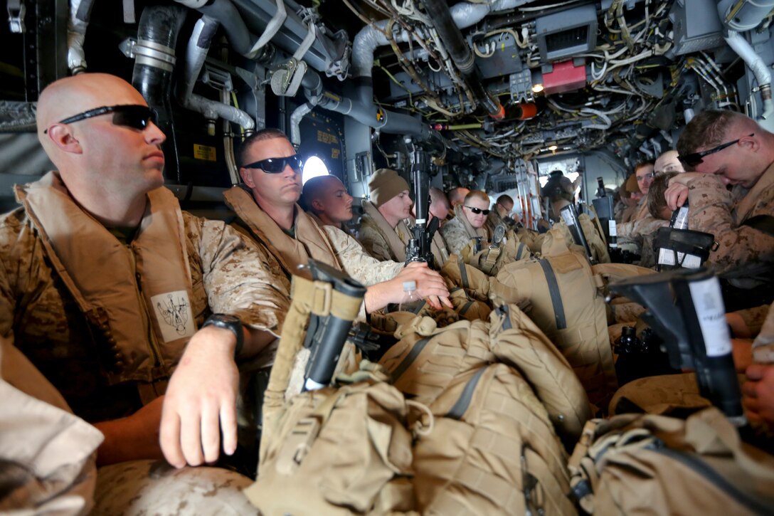 U.S. Marines with Special-Purpose Marine Air-Ground Task Force Crisis Response board an MV-22B tiltrotor Osprey travelling to Tifnit Military Instillation, Morocco, April 3, 2014 as a part of exercise African Lion 14. SP-MAGTF Crisis Response is a self-deployable, highly mobile response force allocated to U.S. Africa Command to respond to missions in permissive and uncertain environments to protect U.S. citizens, interests and other designated persons. SP-MAGTF Crisis Response participated in the exercise  to train their rapid response capability. (U.S. Marine Corps photo by Lance Cpl. Alexander Hill/Released)
