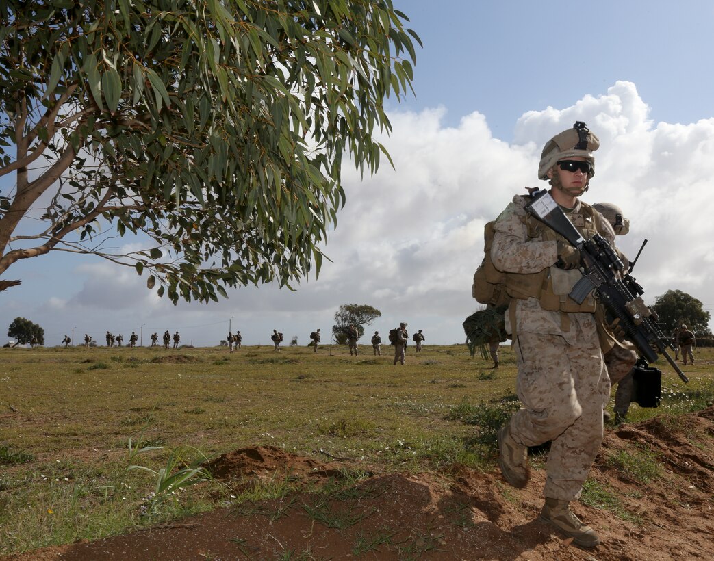 U.S. Marines with Special-Purpose Marine Air-Ground Task Force Crisis Response conduct landing zone security at Tifnit Military Instillation, Morocco, April 3, 2014 during exercise African Lion 14. SP-MAGTF Crisis Response is a self-deployable, highly mobile response force allocated to U.S. Africa Command to respond to missions in permissive and uncertain environments to protect U.S. citizens, interests and other designated persons. SP-MAGTF Crisis Response participated in the exercise  to train their rapid response capability. (U.S. Marine Corps photo by Lance Cpl. Alexander Hill/Released)
