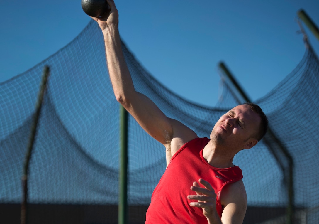 Cody Caraker throws the shot put during the track and field portion of the Air Force Trials April 8, 2014, at Rancho High School in Las Vegas, Nev. The Air Force Trials give injured, ill and wounded Airmen a chance to compete in Paralympic-style events.  (U.S. Air Force photo/Senior Airman Jette Carr)