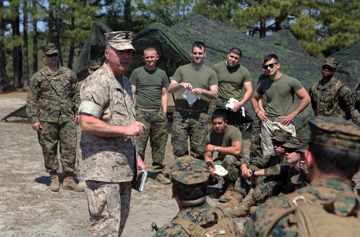 Navy Capt. Michael Sokolowski, the commanding officer of 2nd Medical Battalion, Combat Logistics Regiment 25, 2nd Marine Logistics Group, speaks to Marines and sailors with the battalion during a medical field exercise aboard Camp Lejeune, N.C., April 2, 2014. The unit is scheduled to begin conducting similar exercises on a regular basis to better prepare both corpsmen and Marines for the care and treatment of large numbers of casualties.