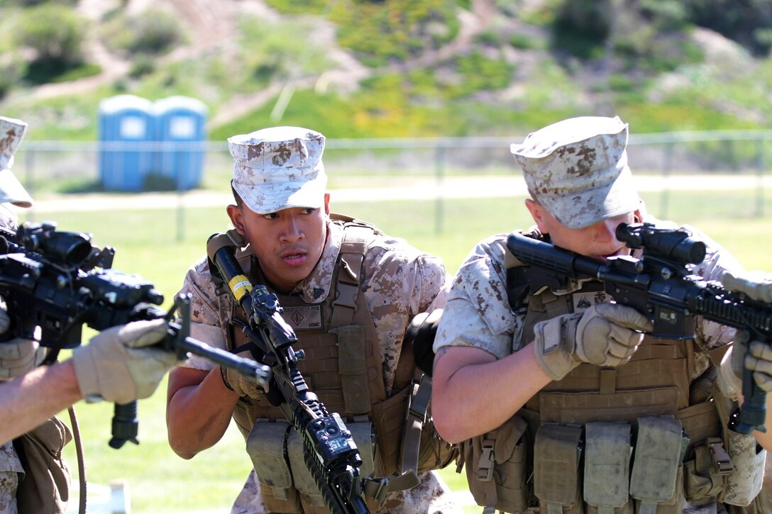 Marines practice assaulting buildings and clearing rooms during the Division School’s Urban Leaders Course aboard Marine Corps Base Camp Pendleton, Calif., April 3, 2014. The Marines are given a scenario and are required to plan and conduct assault missions. The course teaches Marines the importance of teamwork and strategy when conducting urban combat operations. (U.S. Marine Corps photo by Lance Cpl. Joshua Murray/released)

