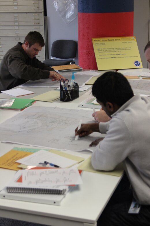 Veterans Vadi Dodge and Doug Blain rehabilitate historic maps in the Veterans Curation Program lab in St. Louis as part of their work supporting the U.S. Army Corps of Engineers’ mission to preserve and manage the Army’s vast archaeological collection. The VCP has three labs in which veterans receive technical training in preserving and archiving archaeological collections under the direct supervision of professionals in the field of archaeology. 