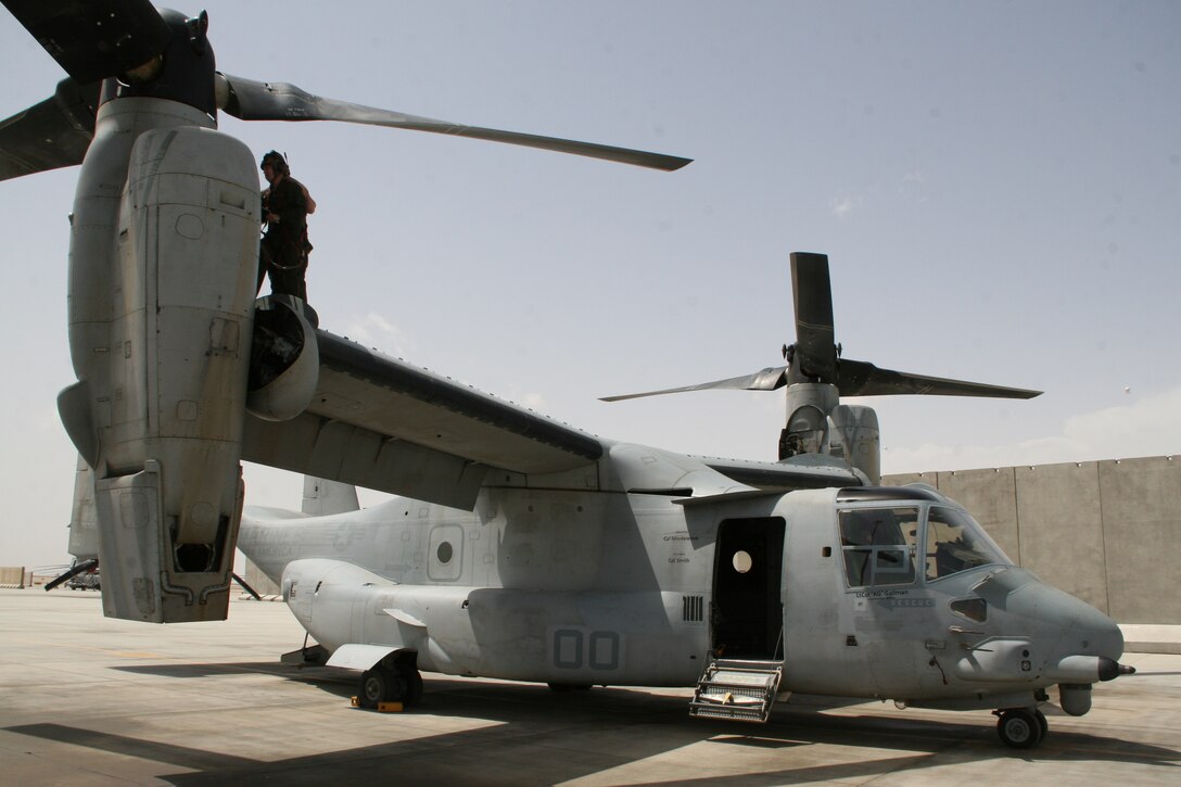 Sergeant Josiah M. Fox, a crew chief with Marine Medium Tiltrotor Squadron 261, works on an MV-22B Osprey in order to maintain the aircraft’s readiness aboard Camp Bastion, Helmand province, Afghanistan, April 5, 2014. The Marine Corps unit has the responsibility for being the first responders for casualty evacuations throughout the Regional Command (Southwest) area of operations.
