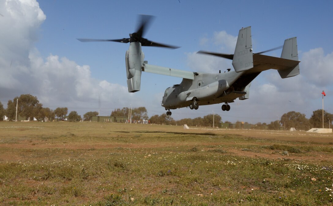 An MV-22B tiltrotor Osprey with Special-Purpose Marine Air-Ground Task Force Crisis Response takes off from Tifnit Military Instillation, Morocco, April 3, 2014 during exercise African Lion 14. SP-MAGTF Crisis Response is a self-deployable, highly mobile response force allocated to U.S. Africa Command to respond to missions in permissive and uncertain environments to protect U.S. citizens, interests and other designated persons. SP-MAGTF Crisis Response participated in the exercise  to train their rapid response capability.(U.S. Marine Corps photo by Lance Cpl. Alexander Hill/Released)
