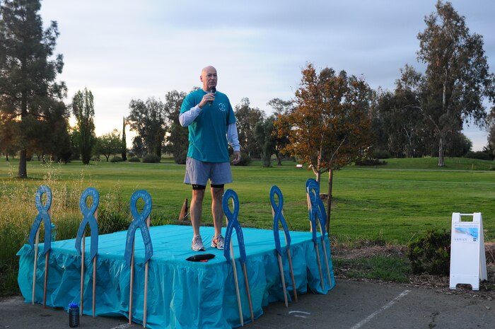 Col. Quinn Gummel, 9th Reconnaissance Wing vice commander, speaks to Team Beale during a 5K Teal Run to kick-off Sexual Assault Awareness Month at Beale Air Force Base, Calif., April 4, 2014. More than 300 runners participated in the event. (U.S. Air Force photo by Senior Airman Allen Pollard/Released)
