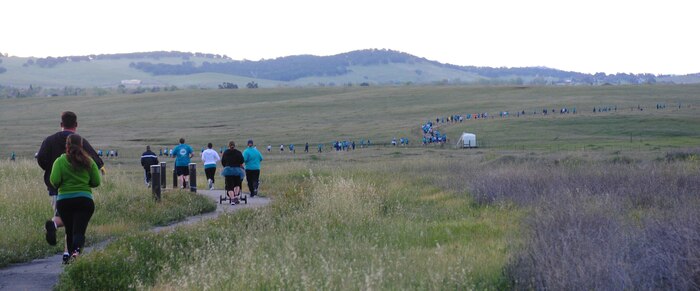 More than 300 runners participate in a 5K Teal Run to kick-off Sexual Assault Awareness Month at Beale Air Force Base, Calif., April 4, 2014. Team Beale was encouraged to wear teal colors to recognize Sexual Assault Awareness Month. (U.S. Air Force photo by Senior Airman Allen Pollard/Released)