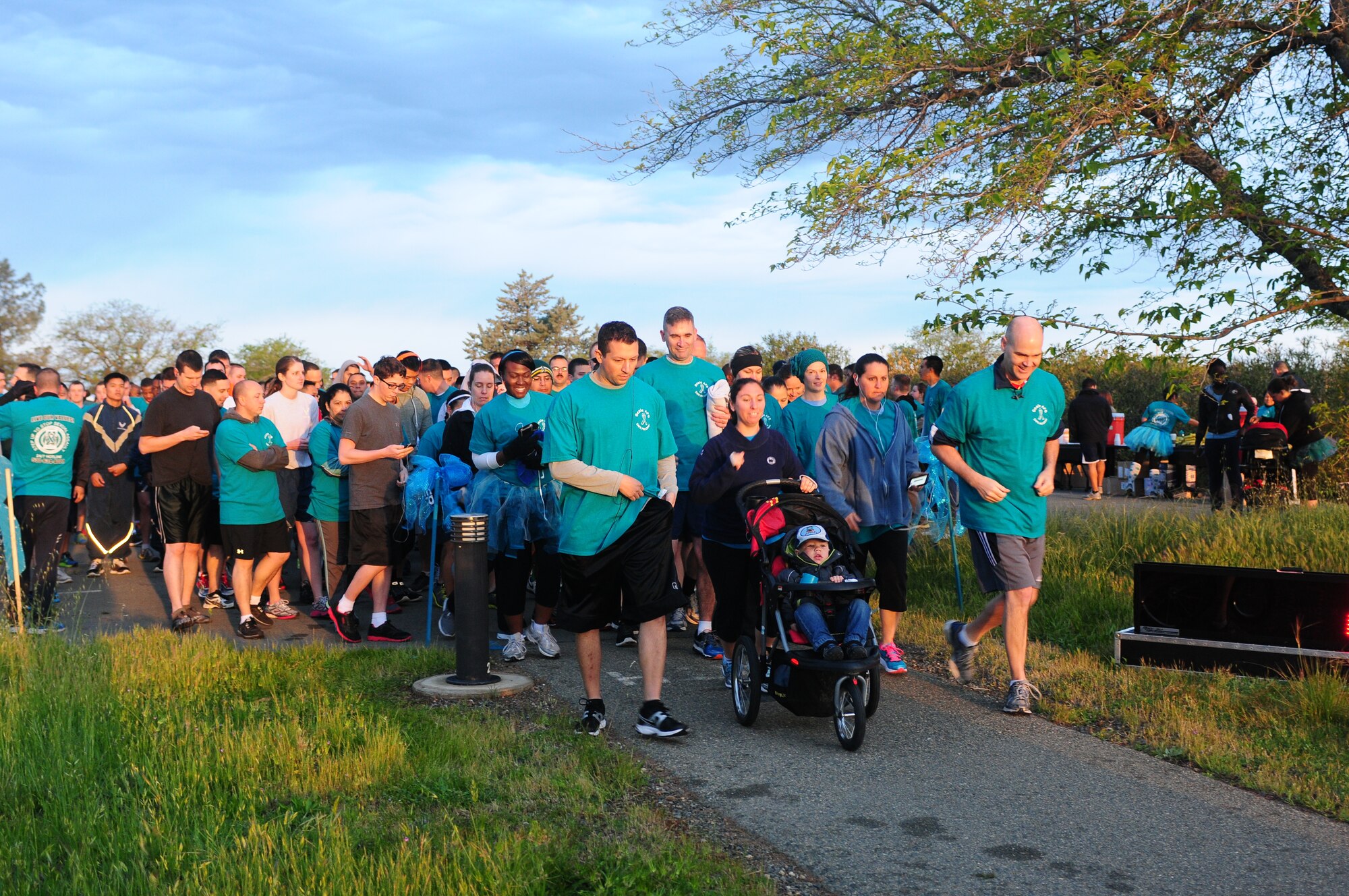 More than 300 runners participate in a 5K Teal Run to kick-off Sexual Assault Awareness Month at Beale Air Force Base, Calif., April 4, 2014. This year’s theme is, “Live Our Values, Step Up, and Stop Sexual Assault.” (U.S. Air Force photo by Senior Airman Allen Pollard/Released)