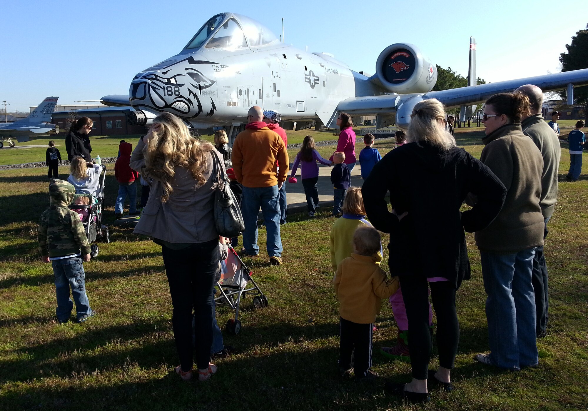 The Believers Home School Group gets an up-close look at an A-10C Thunderbolt II “Warthog” during a tour of the 188th Fighter Wing April 9, 2014. Approximately 115 members of the group toured the 188th’s Security Forces Squadron, Fire Emergency Services Flight and A-10 static display. The group also received a mission briefing on the 188th’s on-going conversion from fighters to an Intelligence, Reconnaissance and Surveillance, space-focused targeting and remotely piloted aircraft mission.  (U.S. Air National Guard photo by Maj. Heath Allen/Released)