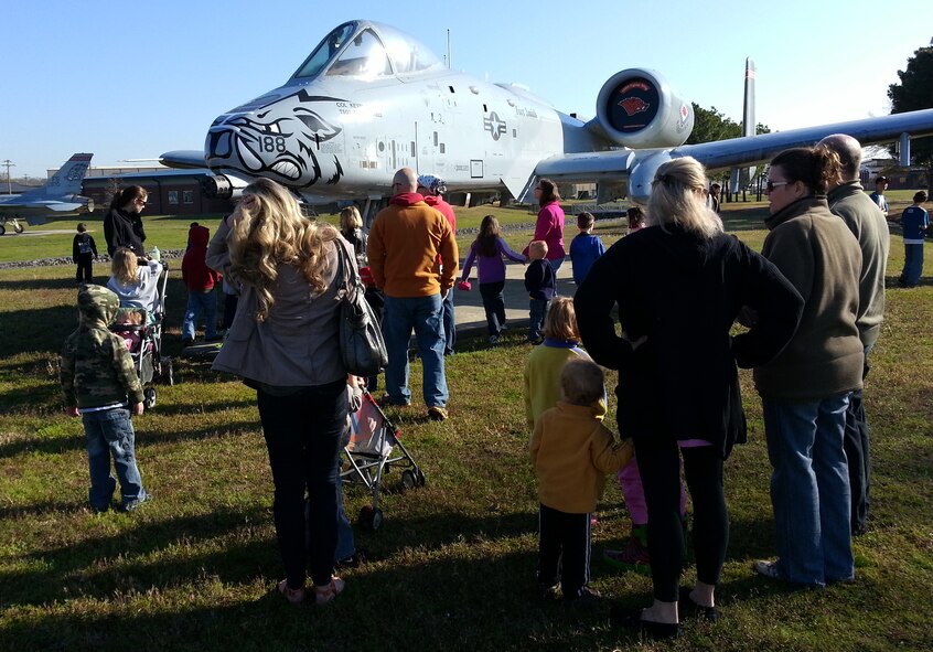 The Believers Home School Group gets an up-close look at an A-10C Thunderbolt II “Warthog” during a tour of the 188th Fighter Wing April 9, 2014. Approximately 115 members of the group toured the 188th’s Security Forces Squadron, Fire Emergency Services Flight and A-10 static display. The group also received a mission briefing on the 188th’s on-going conversion from fighters to an Intelligence, Reconnaissance and Surveillance, space-focused targeting and remotely piloted aircraft mission.  (U.S. Air National Guard photo by Maj. Heath Allen/Released)