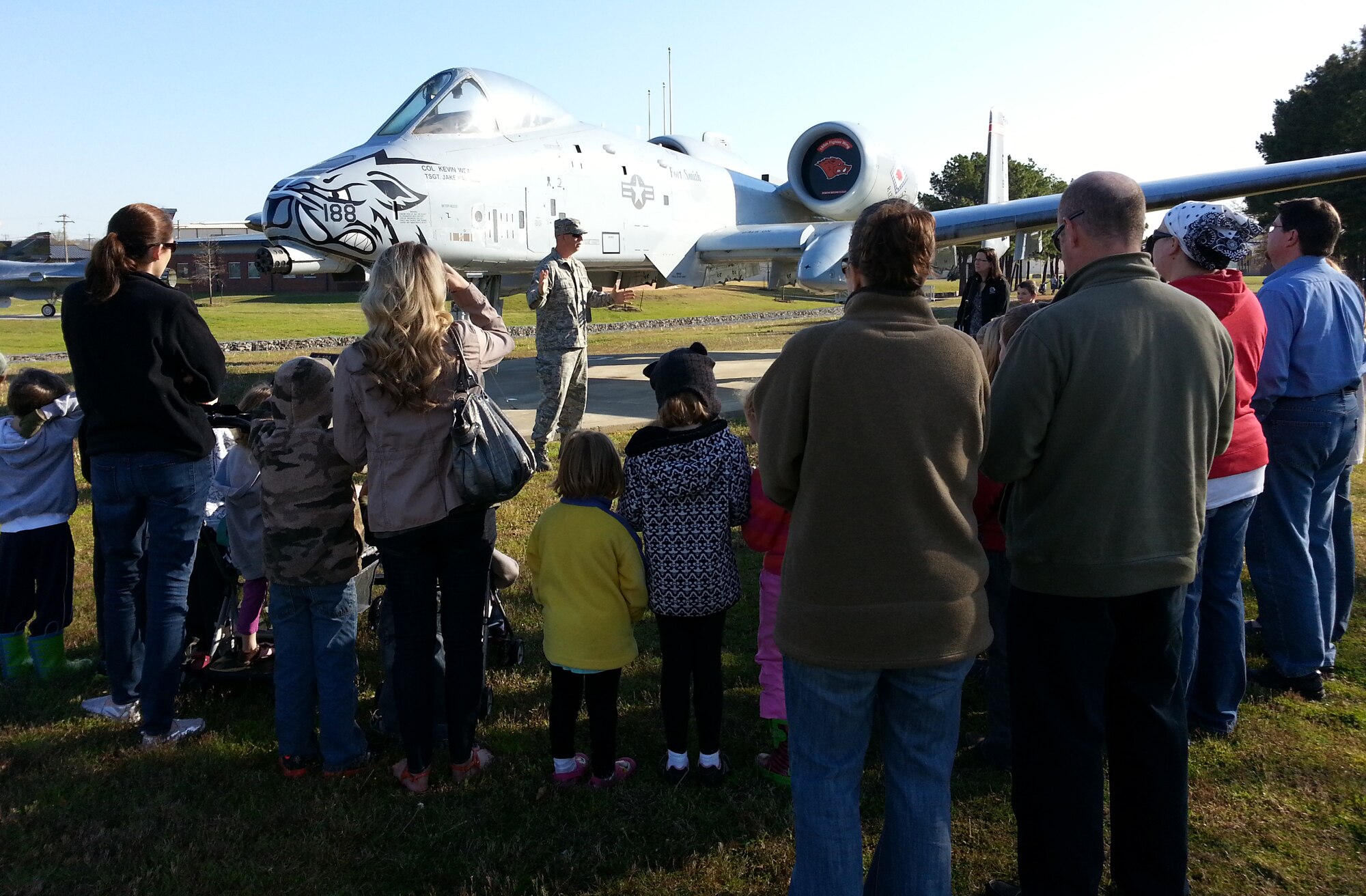 Tech Sgt. Leon Warrick of the 188th Aircraft Maintenance Squadron briefs Believers Home School Group on the capabilities of the A-10C Thunderbolt II “Warthog” during a tour of the 188th Fighter Wing April 9, 2014. Approximately 115 members of the group toured the 188th’s Security Forces Squadron, Fire Emergency Services Flight and A-10 static display. The group also received a mission briefing on the 188th’s on-going conversion from fighters to an Intelligence, Reconnaissance and Surveillance, space-focused targeting and remotely piloted aircraft mission.  (U.S. Air National Guard photo by Maj. Heath Allen/Released)