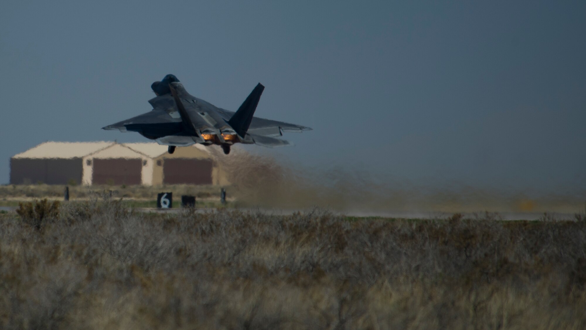 One of the last four F-22 Raptors from the 7th Fighter Squadron prepares to depart for Tyndall Air Force Base, Fla., at Holloman Air Force Base, N.M., April 8. Holloman bids farewell to the F-22 Raptors as the 7th Fighter Squadron transitions its mission to Tyndall to continue training for air superiority. (U.S. Air Force photo by Airman 1st Class Aaron Montoya / Released)