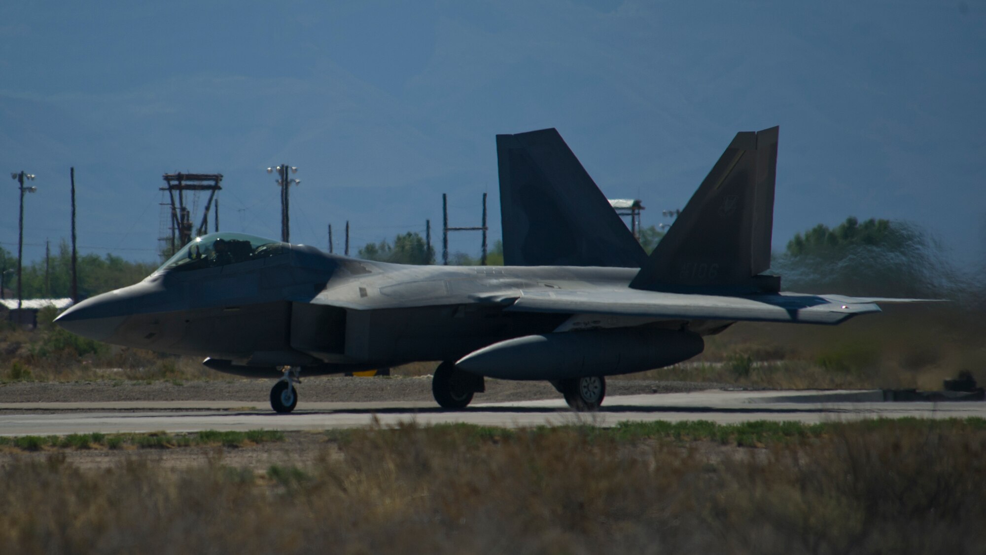 One of the last four F-22 Raptors from the 7th Fighter Squadron prepares to depart for Tyndall Air Force Base, Fla., at Holloman Air Force Base, N.M., April 8. Holloman bids farewell to the F-22 Raptors as the 7th Fighter Squadron transitions its mission to Tyndall to continue training for air superiority. (U.S. Air Force photo by Airman 1st Class Aaron Montoya / Released)