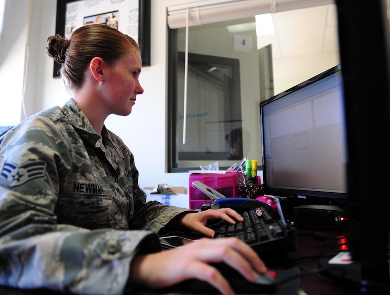 U.S. Air Force Senior Airman Christina Newman, 7th Aerospace Medicine Squadron hearing conservation program manager, reviews results of a hearing test April 3, 2014, at Dyess Air Force Base, Texas. The occupational health program ensures the health and safety of workers on base by assuring they are wearing the correct personal -protective equipment and receive their annual medical requirements such as hearing and eye exams. (U.S. Air Force photo by Senior Airman Kia Atkins/Released)