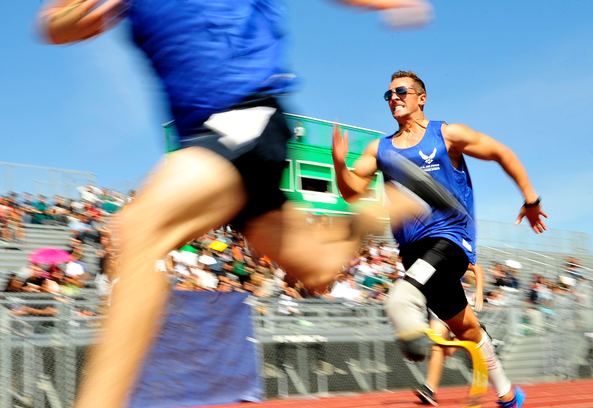 Wounded warrior, (Ret) Senior Airman Gildeon Connelly runs in the 100-meter race at the Air Force Wounded Warrior Team Trials, April 8, 2014 at Rancho High School, Las Vegas.  All Air Force Wounded Warrior enrollees are encouraged to make athletics an essential part of their recovery and rehabilitation. (U.S. Air Force photo by Senior Master Sgt. Cecilio Ricardo)

