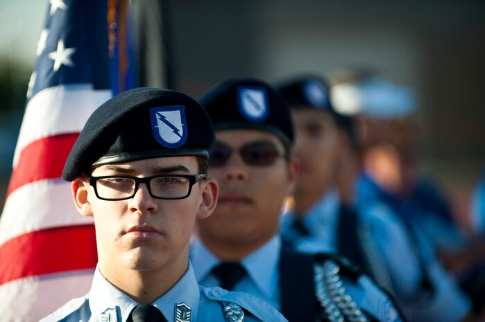 The Rancho High School Junior Air Force Reserve Officers Training Corps prepares to post the colors at the track and field portion of the Air Force Wounded Warrior Team Trials April 8, 2014, Rancho High School, Las Vegas, Nev. This event is a competitive adaptive sports camp which will identify the most skilled wounded warrior athletes. (U.S. Air Force photo by Airman 1st Class Thomas Spangler)