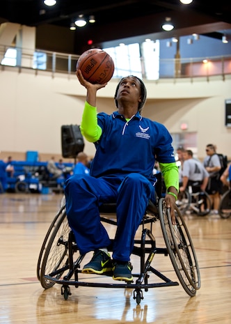 Warrior athlete Colby Dean prepares to shoot a lay-up during the Air Force Wounded Warrior Team Trials at the Warrior Fitness Center, April 7, 2014, at Nellis Air Force Base, Nev. The goal of the Air Force Trials is to identify the most skilled wounded warrior athletes and end the event with two specific teams selected. Air Force Wounded Warrior’s main goal is to return Airmen to duty, and when that is not possible, to work with collaboratively with federal agencies and local organizations to ensure a service member’s successful reintegration back into his or her community. (U.S. Air Force photo by Airman 1st Class Thomas Spangler)