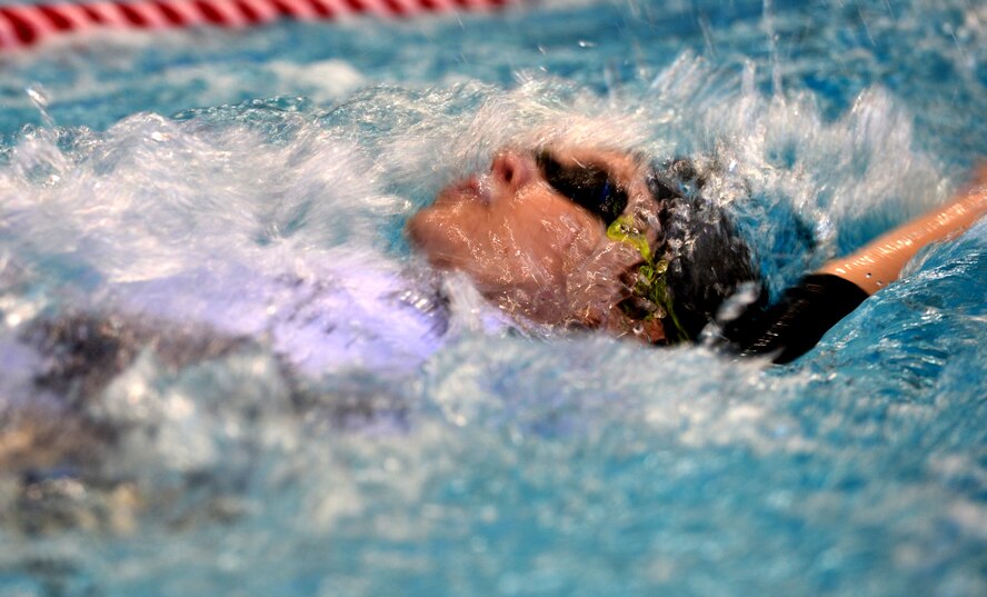 Capt. Sarah Evans, 59th Medical Wing Patient Squadron, swims during the Air Force Wounded Warrior Team Trials at the University of Nevada, Las Vegas, Natatorium swimming pool, April 7, 2014.  Evans placed first in the women's 50-meter freestyle race. (U.S. Air Force photo by Staff Sgt. Nadine Barclay)