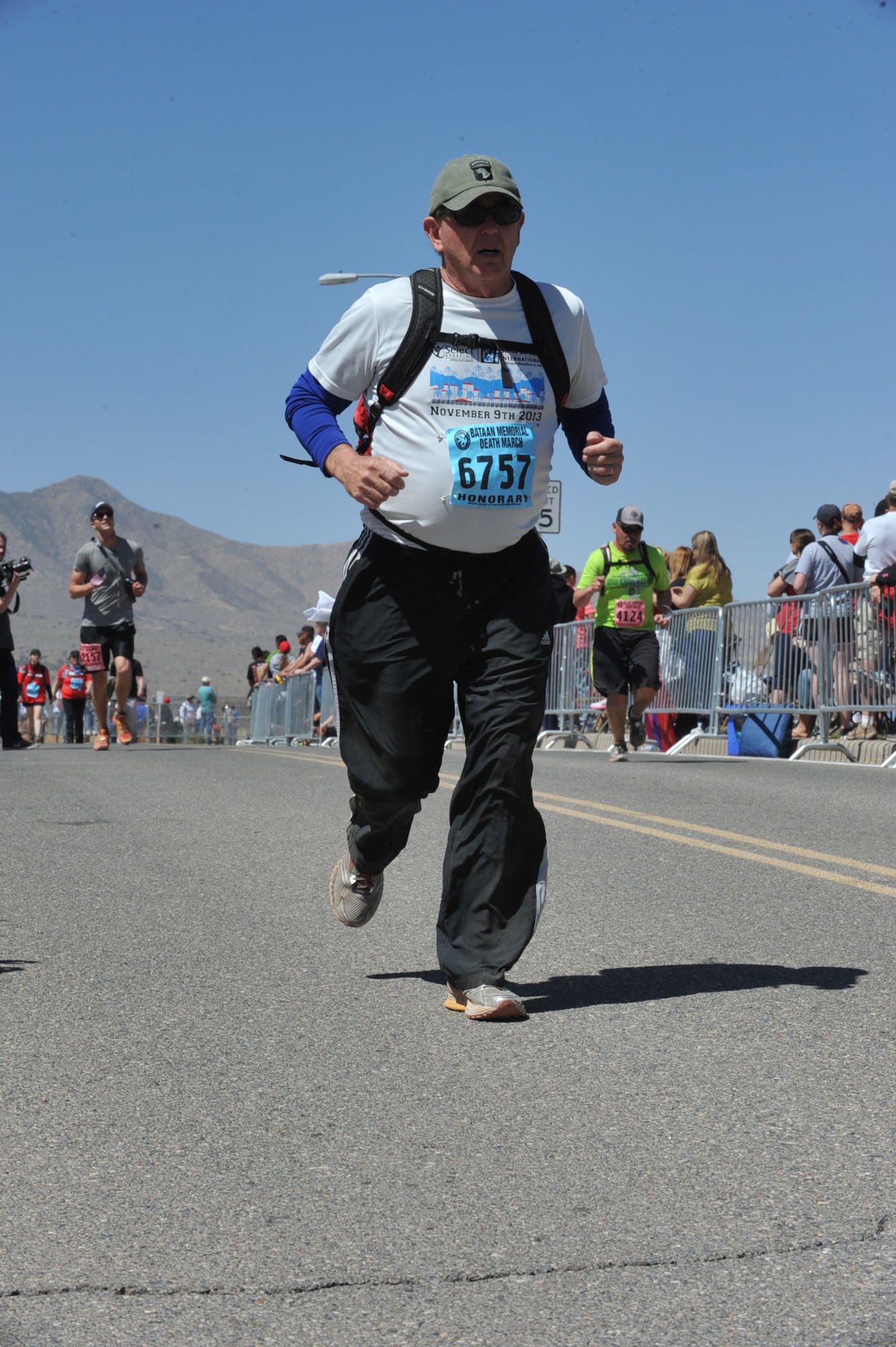 Air Force Research Laboratory historian Bob Duffner as he nears the finish line at the 25th annual Bataan Memorial Death March at White Sands Missile Range, N.M.  March 23. (Courtesy photo)