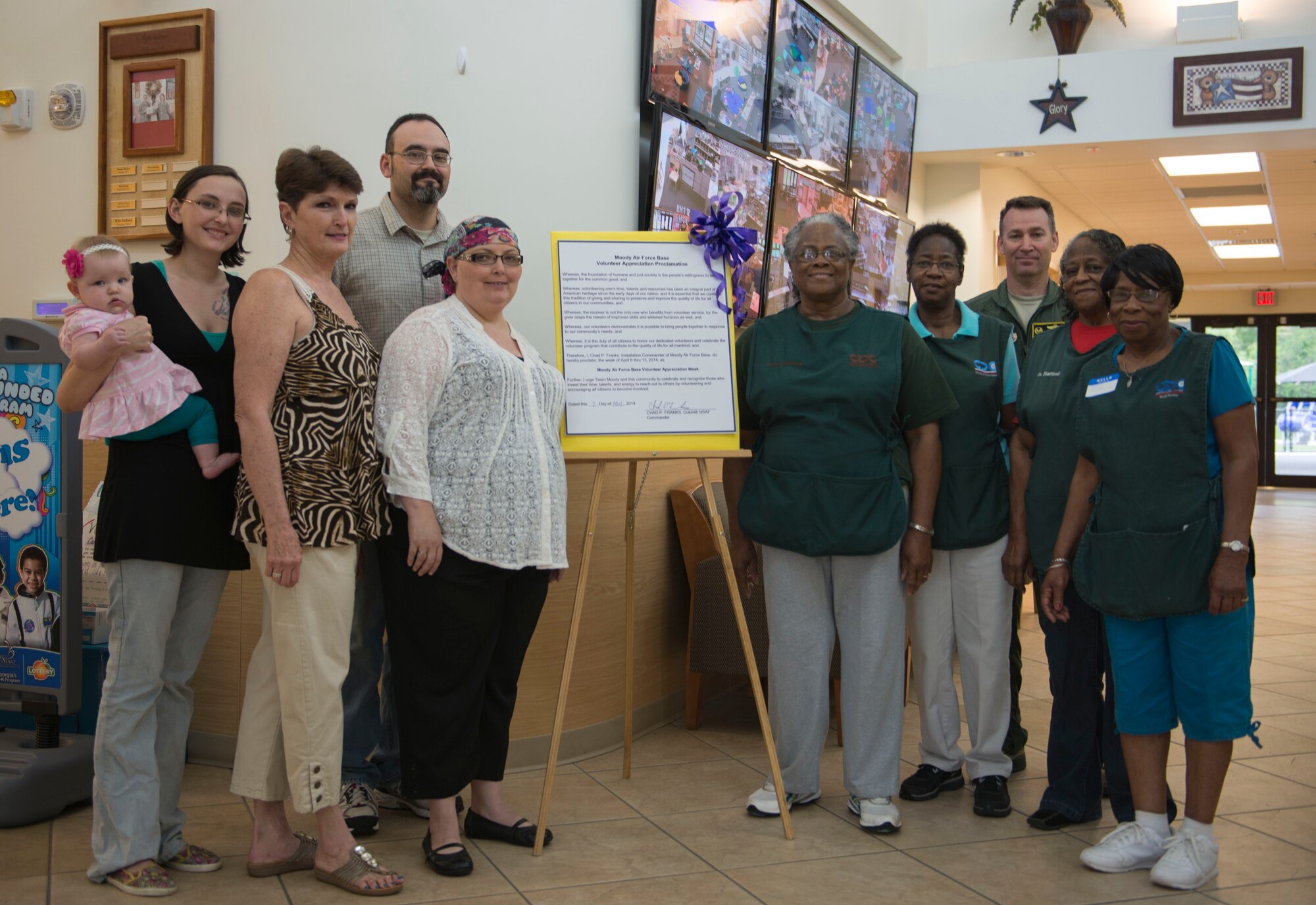Moody volunteers and U.S. Air Force Col. Chad Franks, 23d Wing commander, kick off Volunteer Appreciation Week with a proclamation ceremony at Moody Air Force Base, Ga., April 7, 2014. This year’s VAW will be held April 6-13 and will recognize the many volunteers throughout Moody who have dedicated their time to the community. (U.S. Air Force photo by Airman Dillian Bamman/Released)