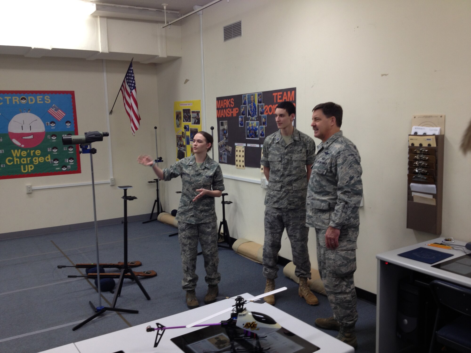 Brig. Gen. John P. Horner, Air Force Recruiting Service commander (right), learns about the Science, Technology, Engineering and Math laboratory built by Air Force Junior ROTC cadets at Yokota High School, Japan. Horner visited the high school March 13 during his tour of the 369th Recruiting Squadron, which has offices throughout the Pacific Rim of Asia and Oceania, March 9-19. (U.S. Air Force photo)