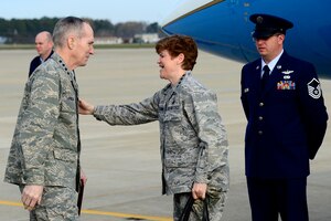 U.S. Air Force Gen. Janet C. Wolfenbarger, commander of Air Force Materiel Commander, is greeted by Gen. Mike Hostage, commander of Air Combat Command, at Langley Air Force Base, Va., April 9, 2014. Wolfenbarger visited with Airmen assigned to the 735th Supply Chain Operations Group. Wolfenbarger is the first female four-star general in the Air Force. (U.S. Air Force photo by Senior Airman Kayla Newman/Released)