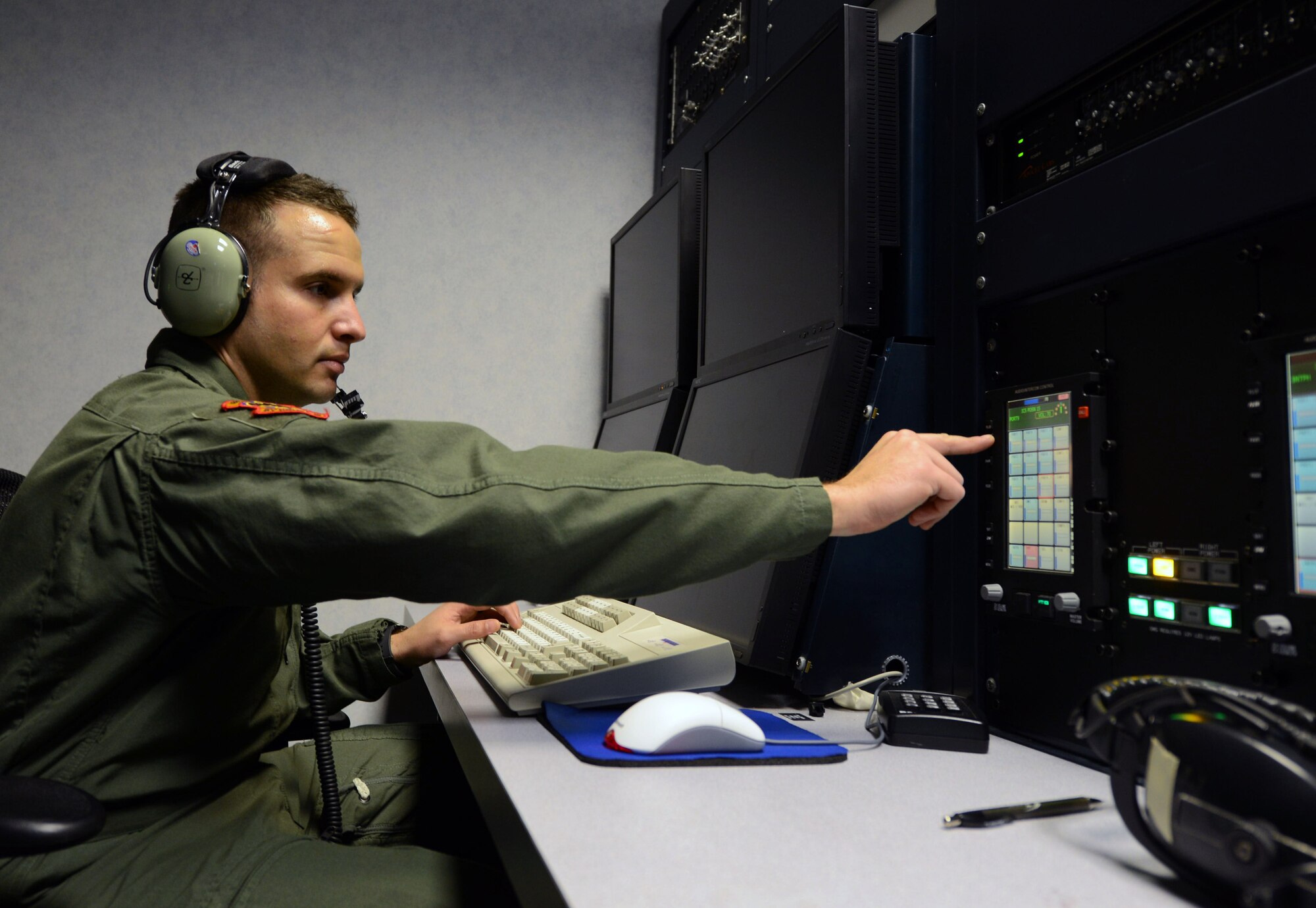 U.S. Air Force Senior Airman Samuel Diaz, 488th Intelligence Squadron airborne cryptologic language analyst from Long Beach, Calif., completes language training April 2, 2014, on RAF Mildenhall, England. Diaz earned the Square D Spotlight for exhibiting the Air Force Core Value of Excellence in All We Do. (U.S. Air Force photo by Airman 1st Class Kyla Gifford/Released)