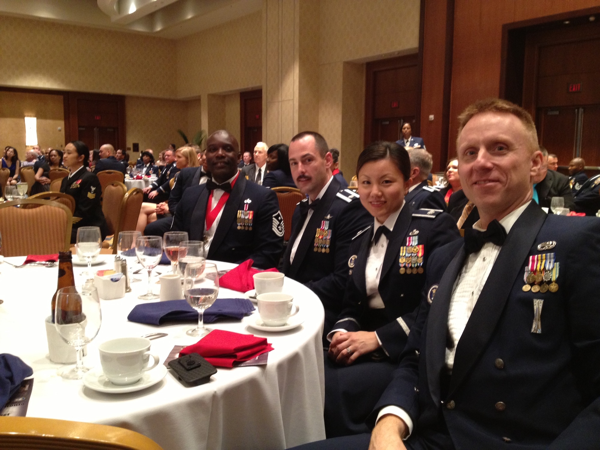 Master Sgt. Melvin Jackson, 341st Recruiting Squadron first sergeant, represented Air Force Recruiting Service at the Joint Base San Antonio Annual Awards Banquet March 29. Tech. Sgt. Talia Walters, 341st RCS line officer recruiter, was also an AFRS nominee in the NCO category. From left to right are Jackson; Lt. Col. Aaron Blair, National Security Agency deputy director of remote and deployed operations; Lt. Col. Angie Blair, 341st RCS commander; and Chief Master Sgt. Mark Bennett, 341 RCS superintendent. (U.S. Air Force photo)