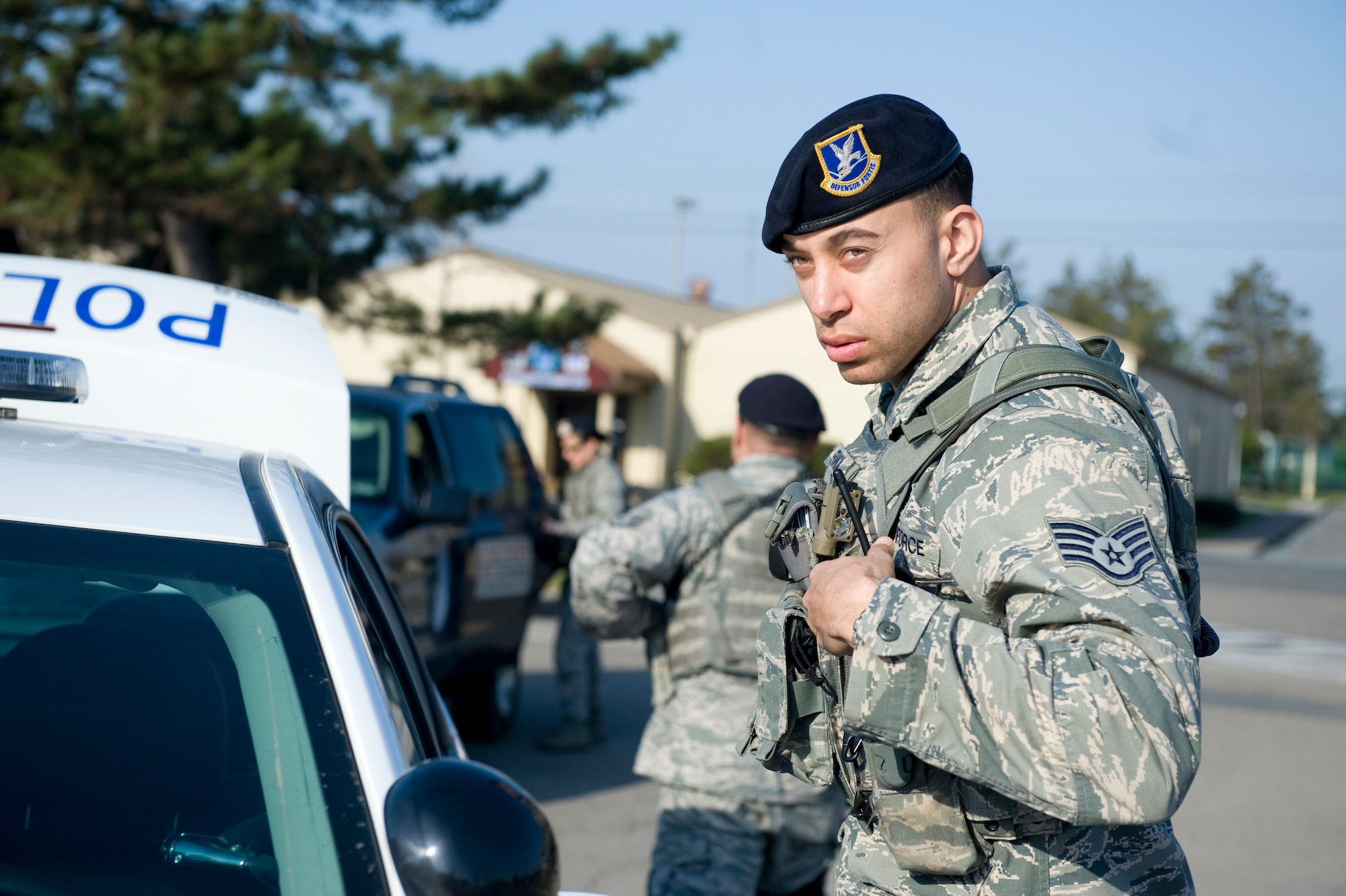 Staff Sgt. Jose Francia, 8th Security Forces Squadron military working dog handler, responds to the active shooter scenario at Kunsan Air Base, Republic of Korea, Apr. 8, 2014. Francia was one of three security forces responders to initially arrive at the scene to neutralize the simulated fthreat so other teams may move in and assist the injured. (U.S. Air Force photo by Staff Sgt. Jessica Haas/Released)