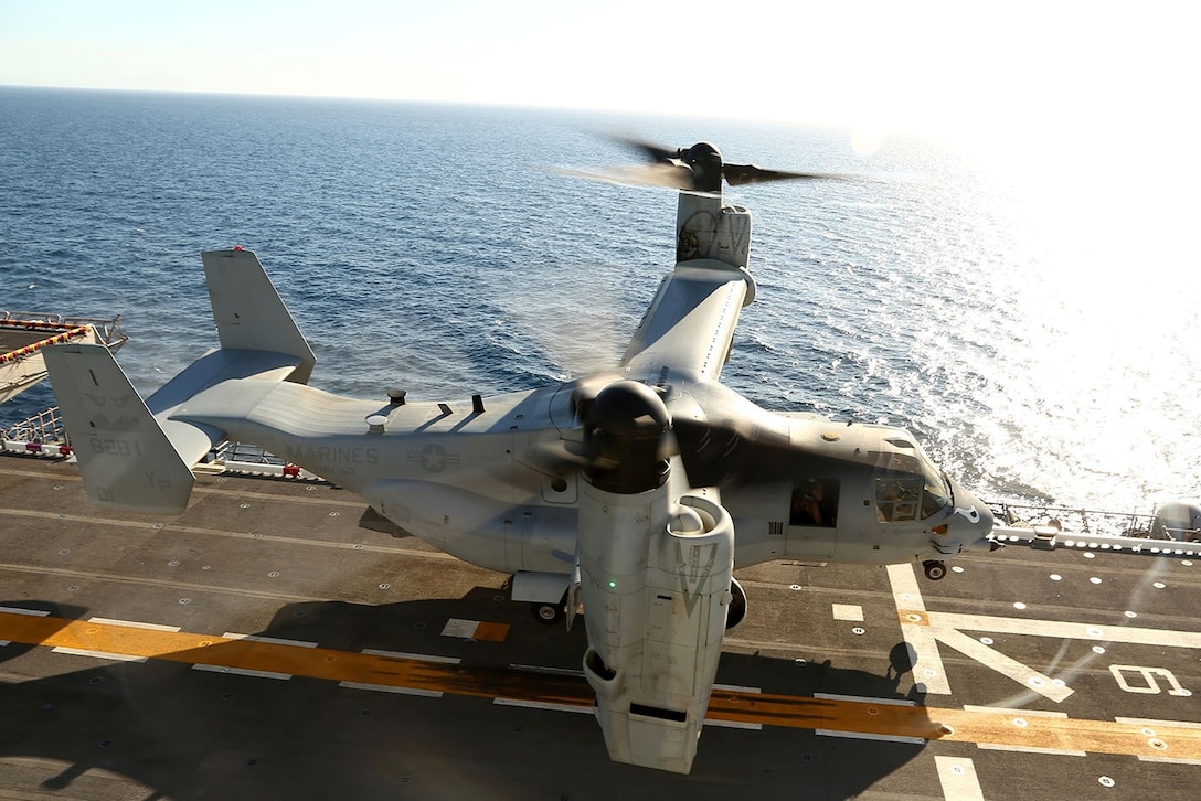 An MV-22B Osprey with Marine Medium Tiltrotor Squadron 163 (Reinforced), 11th Marine Expeditionary Unit, lands on the flight deck during Amphibious Squadron Marine Expeditionary Unit Integration Training (PMINT) off the coast of San Diego, Calif., April 7, 2014.  PMINT is a two-week predeployment training event focused on the combined capabilities of the MEU and Amphibious Ready Group (ARG), conducting amphibious operations, crisis response and limited contingency operations.  (U.S. Marine Corps photo by Lance Cpl. Laura Y Raga/Released)