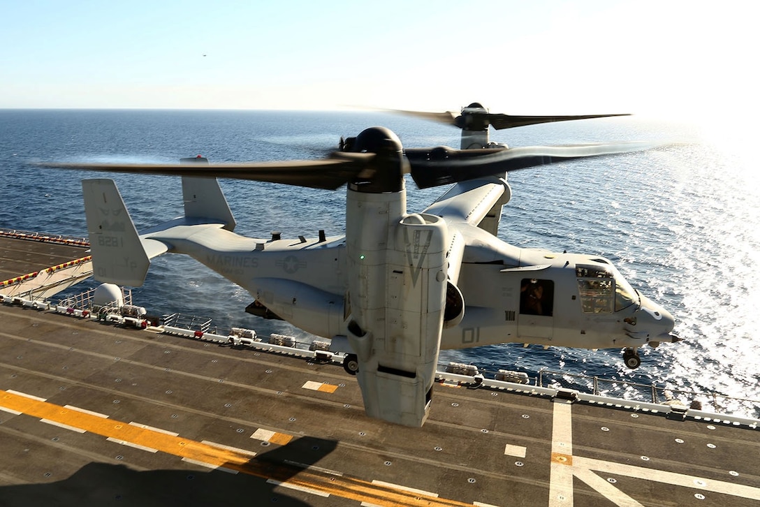 An MV-22B Osprey with Marine Medium Tiltrotor Squadron 163 (Reinforced), 11th Marine Expeditionary Unit, lands on the flight deck during Amphibious Squadron Marine Expeditionary Unit Integration Training (PMINT) off the coast of San Diego, Calif., April 7, 2014.  PMINT is a two-week predeployment training event focused on the combined capabilities of the MEU and Amphibious Ready Group (ARG), conducting amphibious operations, crisis response and limited contingency operations.  (U.S. Marine Corps photo by Lance Cpl. Laura Y Raga/Released)