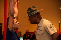 Sgt. Christopher A. Thompson, a Drill Instructor from Marine Corps Recruit Depot San Diego, stares down a poolee during Recruiting Station Milwaukee’s Family Nights pool function, Apr. 5.  Family Nights give poolees their first glimpse into Marine Corps recruit training and allow family members to voice any questions or concerns they may have about recruit training.