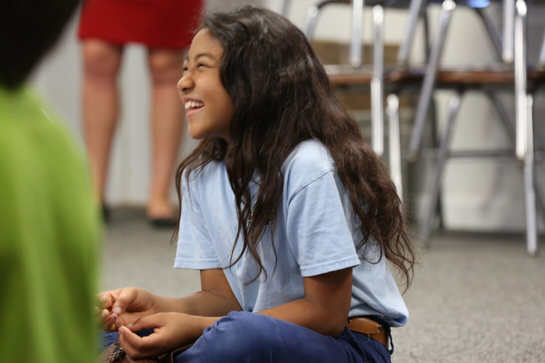 A student from Oaks Road Elementary School in New Bern, N.C., participates in the school’s career day April 4, 2014. Marines volunteered through Marine Corps Air Station Cherry Point’s Single Marine Program to participate in the school’s career day. 