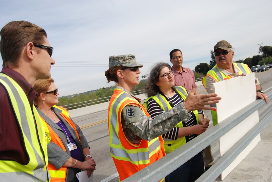 Raina Fulton and Tom Keeney (center and right) brief Los Angeles District commander Col. Kim Colloton on the status of vegetation maintenance along the San Luis Rey River during her April 9 visit to the project. Also participating (from left) are David Van Dorpe, LA District's deputy district engineer for programs and project management, and Michelle Lawrence-Skaggs and Scott Smith, Oceanside's deputy city manager and city engineer, respectively.