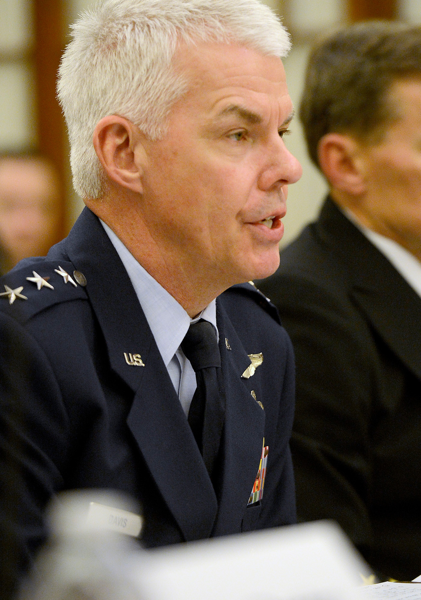 Lt. Gen. Charles R. Davis testifies April 8, 2014, before the Senate Subcommittee on Air and Land in Washington, D.C.  Witnesses from other services at the hearing included Lt. Gen. Christopher C. Bogden, U.S. Air Force Program Executive officer, F-35 Lightning II Joint Program Office; Vice Adm. Paul A. Grosklags, Principal Military Deputy to the Assistant Secretary of the Navy for Research, Development and Acquisition; and Lt. Gen. Robert E. Schmidle Jr., Deputy Commandant of the Marine Corps for Aviation. Davis is the Military Deputy to the Assistant Secretary of the Air Force for Acquisition. (U.S. Air Force photo/Scott M. Ash) 