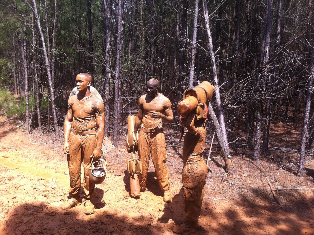 Cpl. Cecil Otieno, a supply clerk with 4th Dental Battalion, 4th Marine Logistics Group, takes a break after a Marine Corps Martial Arts pugil stick fight and grappling. Otieno came to America in 2010 and joined the Marine Corps in 2011. Since his arrival, Otieno has graduated boot camp, become a U.S. citizen and is currently attending college and working toward his dream of becoming a military officer.