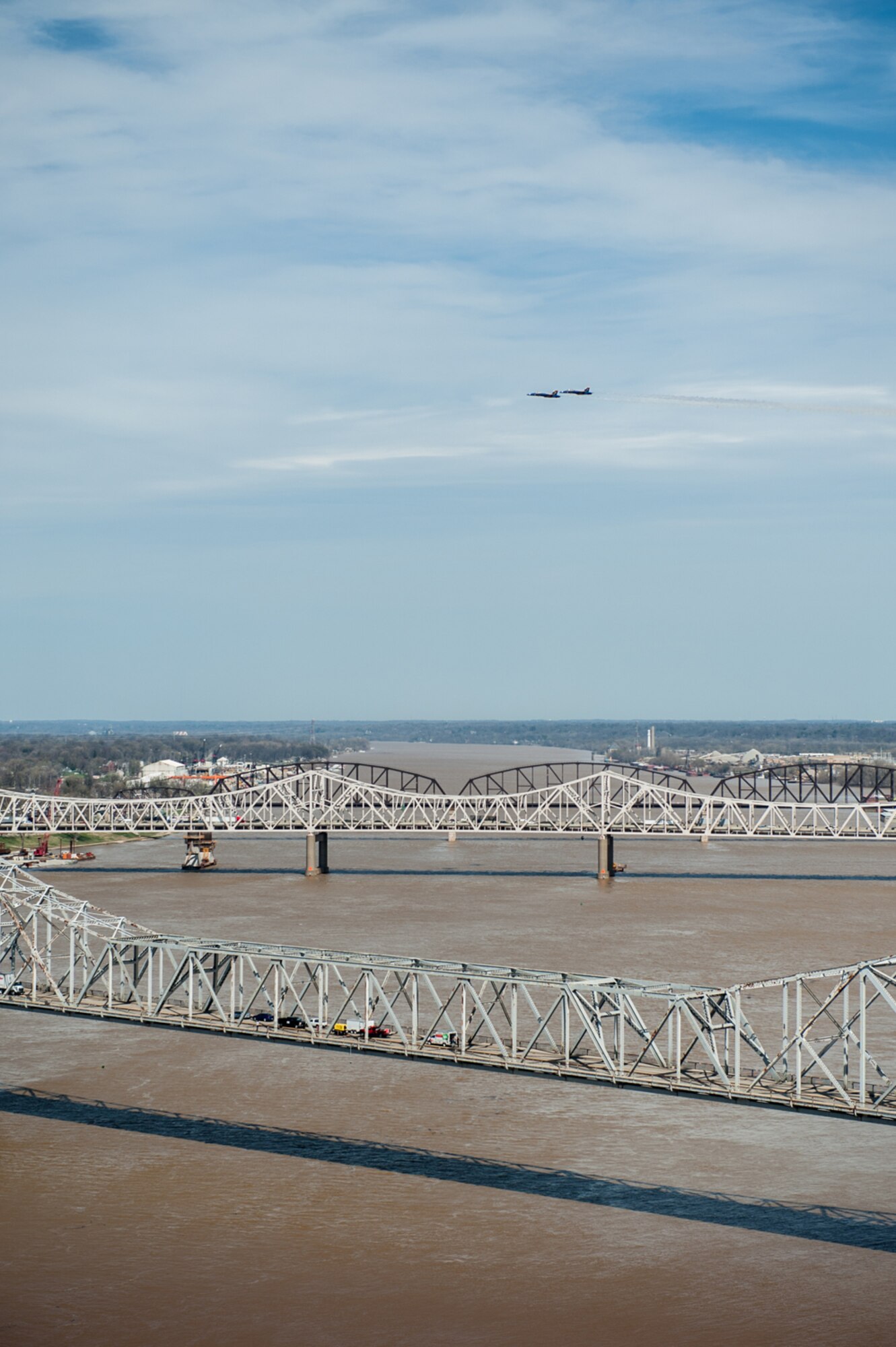 The U.S. Navy Blue Angels practice their aerial demonstration routine over the Ohio River in downtown Louisville, Ky., April 10, 2014. The Blue Angels are performing in this weekend's Thunder Over Louisville air show. (U.S. Air National Guard photo by Maj. Dale Greer)