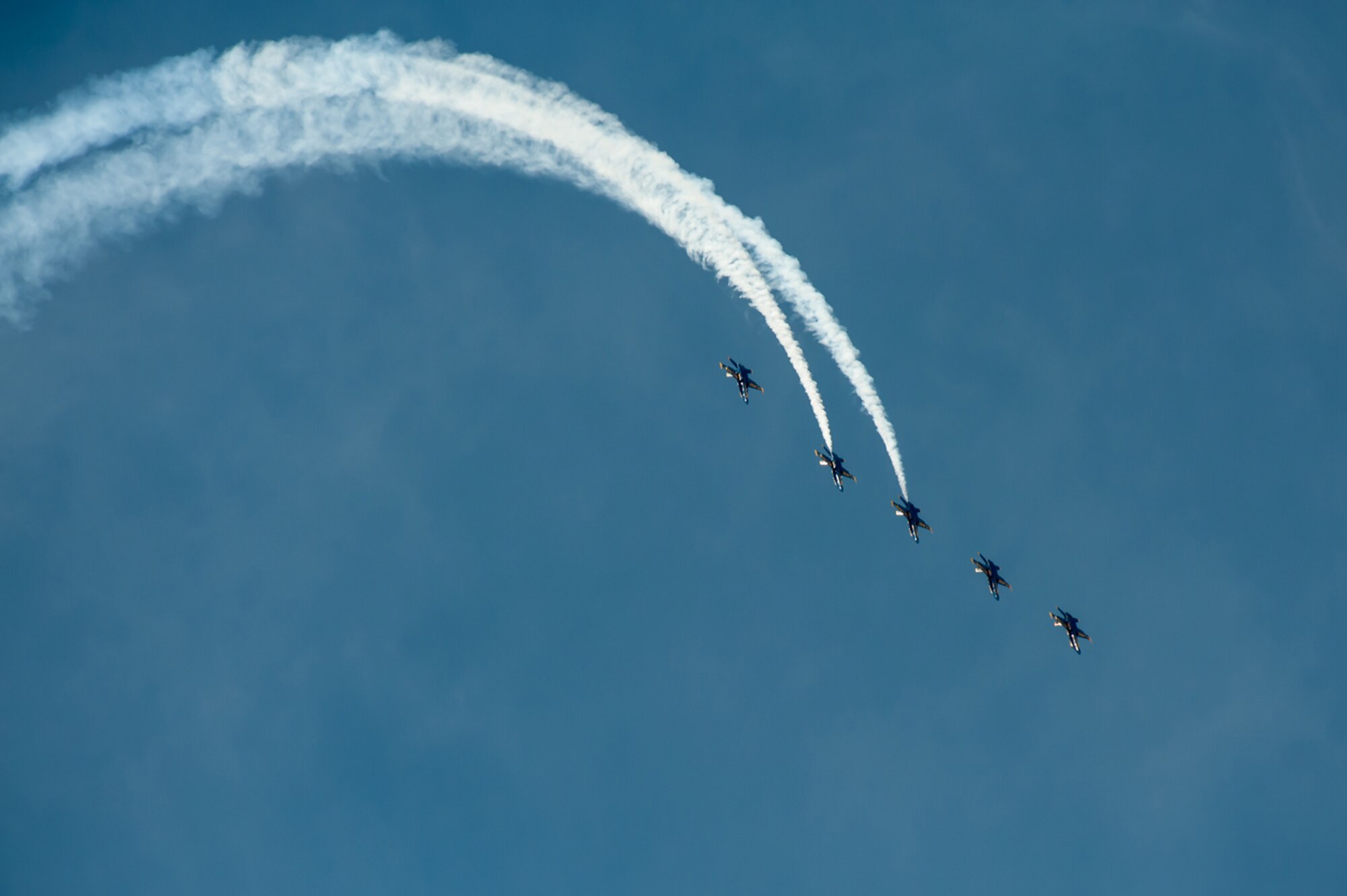The U.S. Navy Blue Angels practice their aerial demonstration routine over the Ohio River in downtown Louisville, Ky., April 10, 2014. The Blue Angels are performing in this weekend's Thunder Over Louisville air show. (U.S. Air National Guard photo by Maj. Dale Greer)