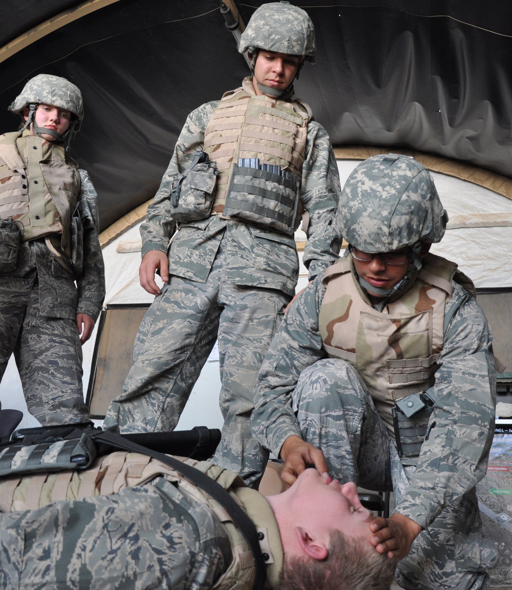 GOODFELLOW AIR FORCE BASE, Texas – Cadet Ruben M. Perez, Angelo State University Air Force ROTC Detachment 847 student, learns how to properly open an airway during a Self-Aid and Buddy Care course at a field training exercise at Camp Sentinel here April 4. Perez and other cadets also learnt to apply tourniquets, treat for shock and how to transport patients. (U.S. Air Force photo/ Senior Airman Joshua Edwards)