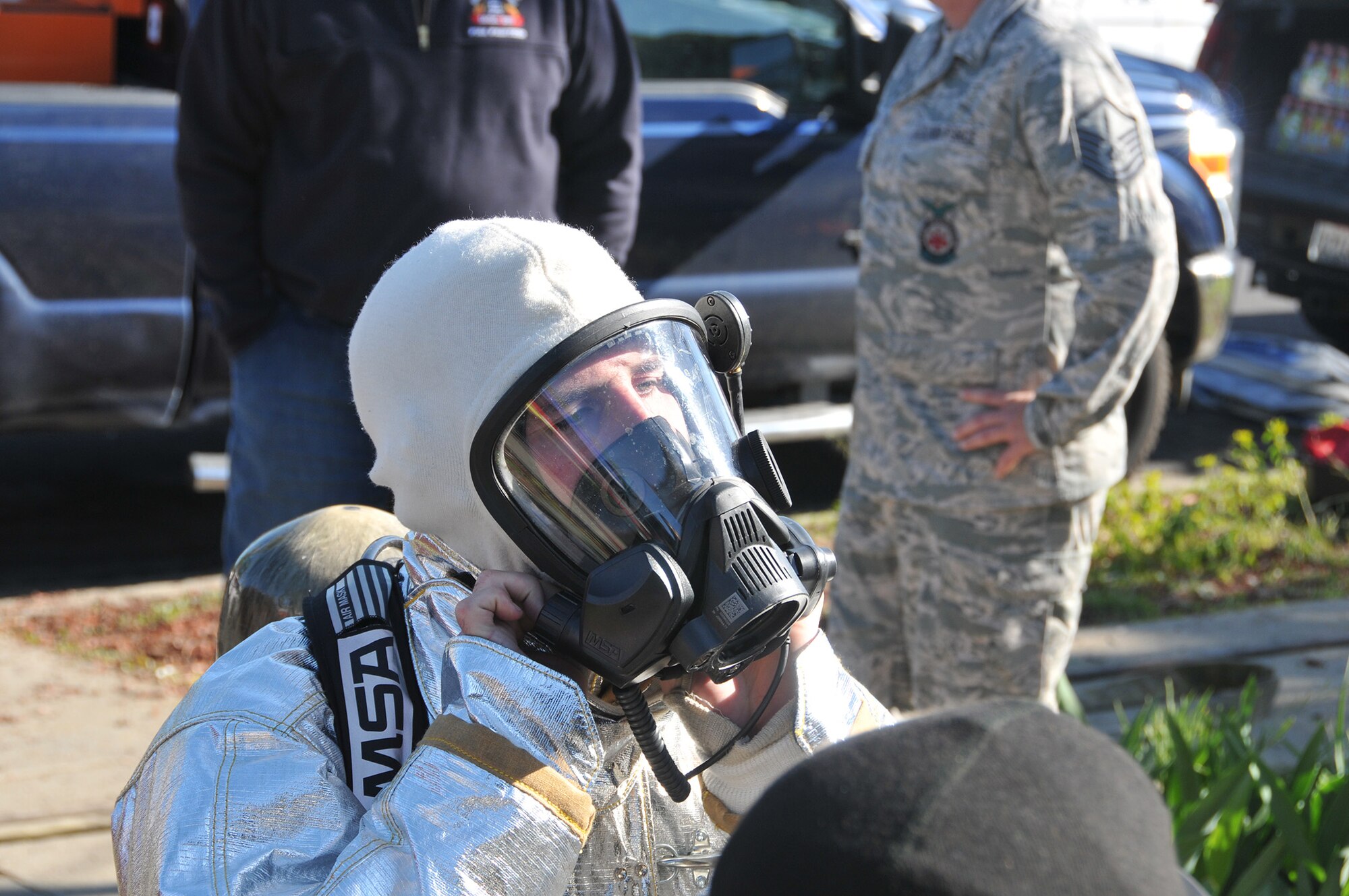 TRAVIS AIR FORCE BASE, Calif. -- Firefighters from Team Travis and Team Beale partnered with firefighters from several local communities, to conduct training at two off-base sites April 5 and 6. Twenty-five Airmen from the 349th and six from the 60th Civil Engineer Squadrons, joined nearly 30 Airmen from the 940th and 9th CES and firefighters from the cities of Vacaville, Fairfield, Dixon, Winters, Suisun City and Benicia, for training to gain additional hands-on experience, and reinforce connections within the neighboring groups. (U.S. Air Force photos / Staff Sgt. Cindy Alejandrez) 