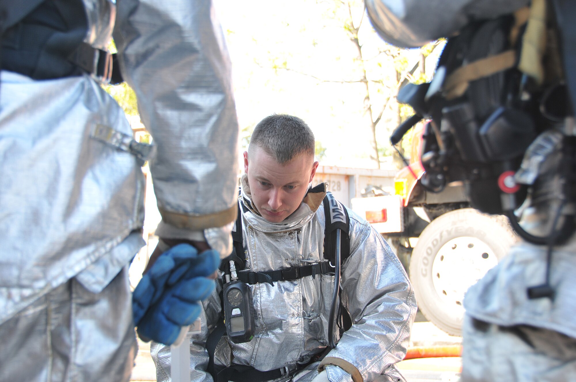 TRAVIS AIR FORCE BASE, Calif. -- Firefighters from Team Travis and Team Beale partnered with firefighters from several local communities, to conduct training at two off-base sites April 5 and 6. Twenty-five Airmen from the 349th and six from the 60th Civil Engineer Squadrons, joined nearly 30 Airmen from the 940th and 9th CES and firefighters from the cities of Vacaville, Fairfield, Dixon, Winters, Suisun City and Benicia, for training to gain additional hands-on experience, and reinforce connections within the neighboring groups. (U.S. Air Force photos / Staff Sgt. Cindy Alejandrez) 