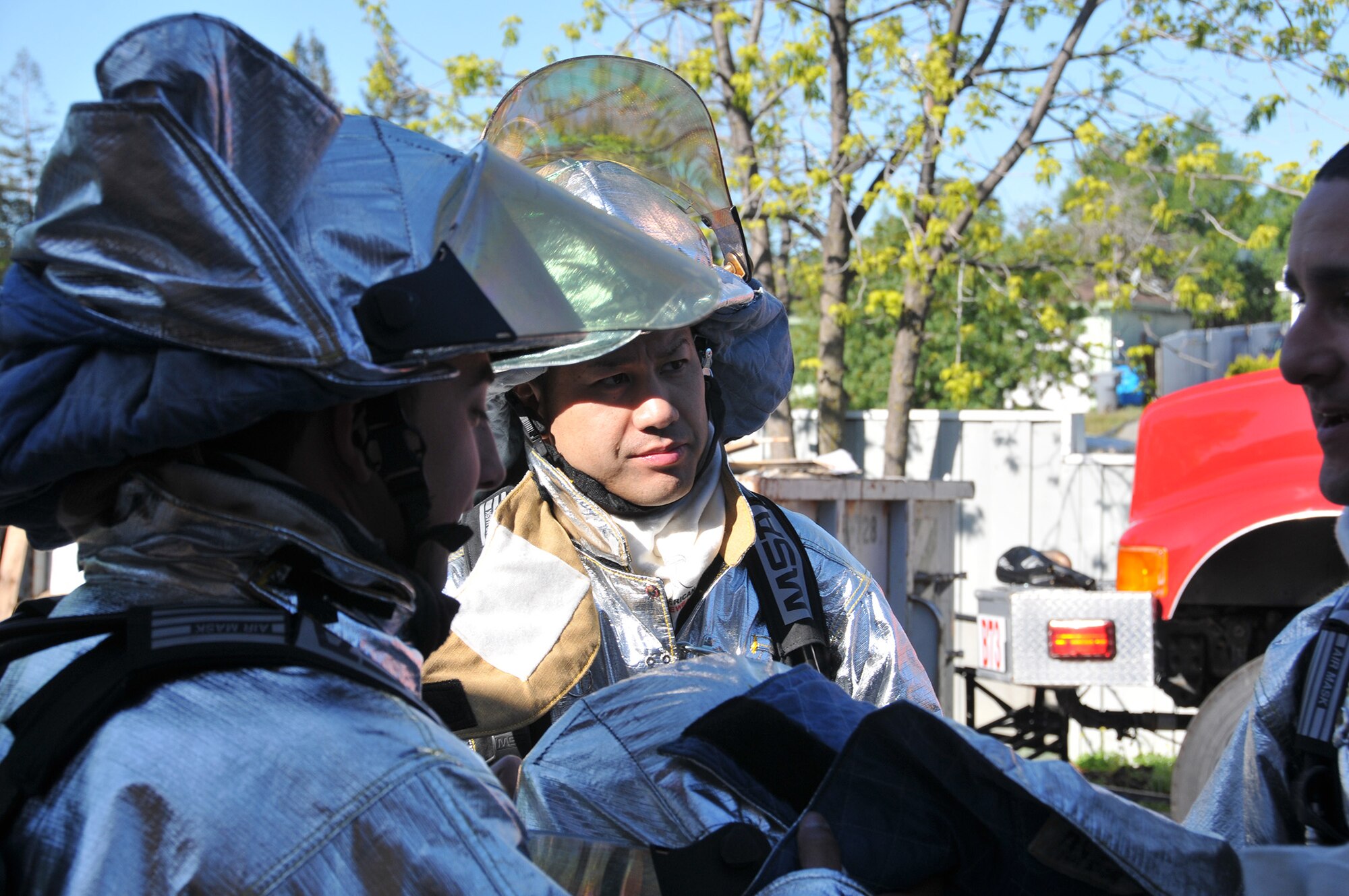 TRAVIS AIR FORCE BASE, Calif. -- Firefighters from Team Travis and Team Beale partnered with firefighters from several local communities, to conduct training at two off-base sites April 5 and 6. Twenty-five Airmen from the 349th and six from the 60th Civil Engineer Squadrons, joined nearly 30 Airmen from the 940th and 9th CES and firefighters from the cities of Vacaville, Fairfield, Dixon, Winters, Suisun City and Benicia, for training to gain additional hands-on experience, and reinforce connections within the neighboring groups. (U.S. Air Force photos / Staff Sgt. Cindy Alejandrez) 